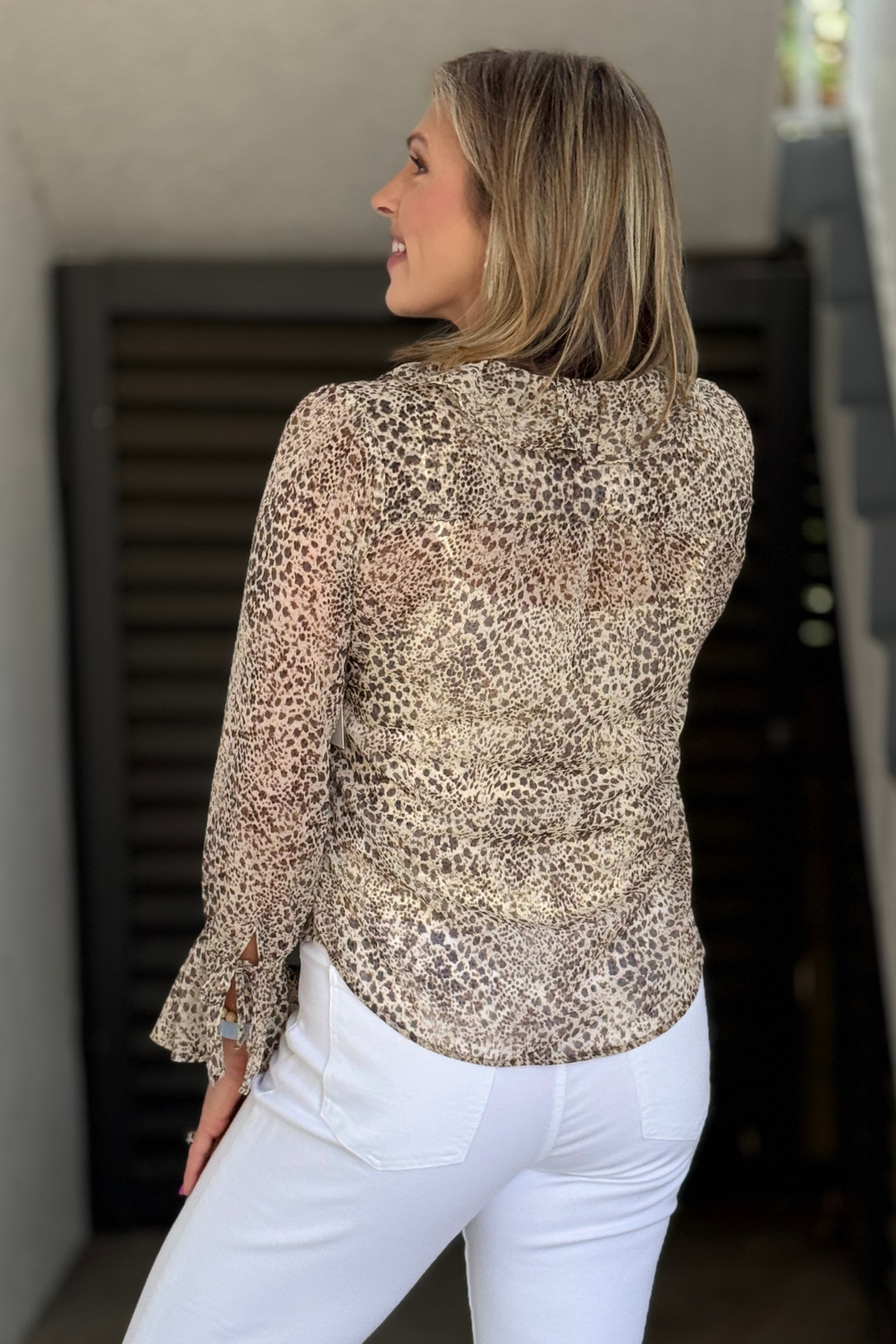 Feminine ruffle front blouse in brown multi print