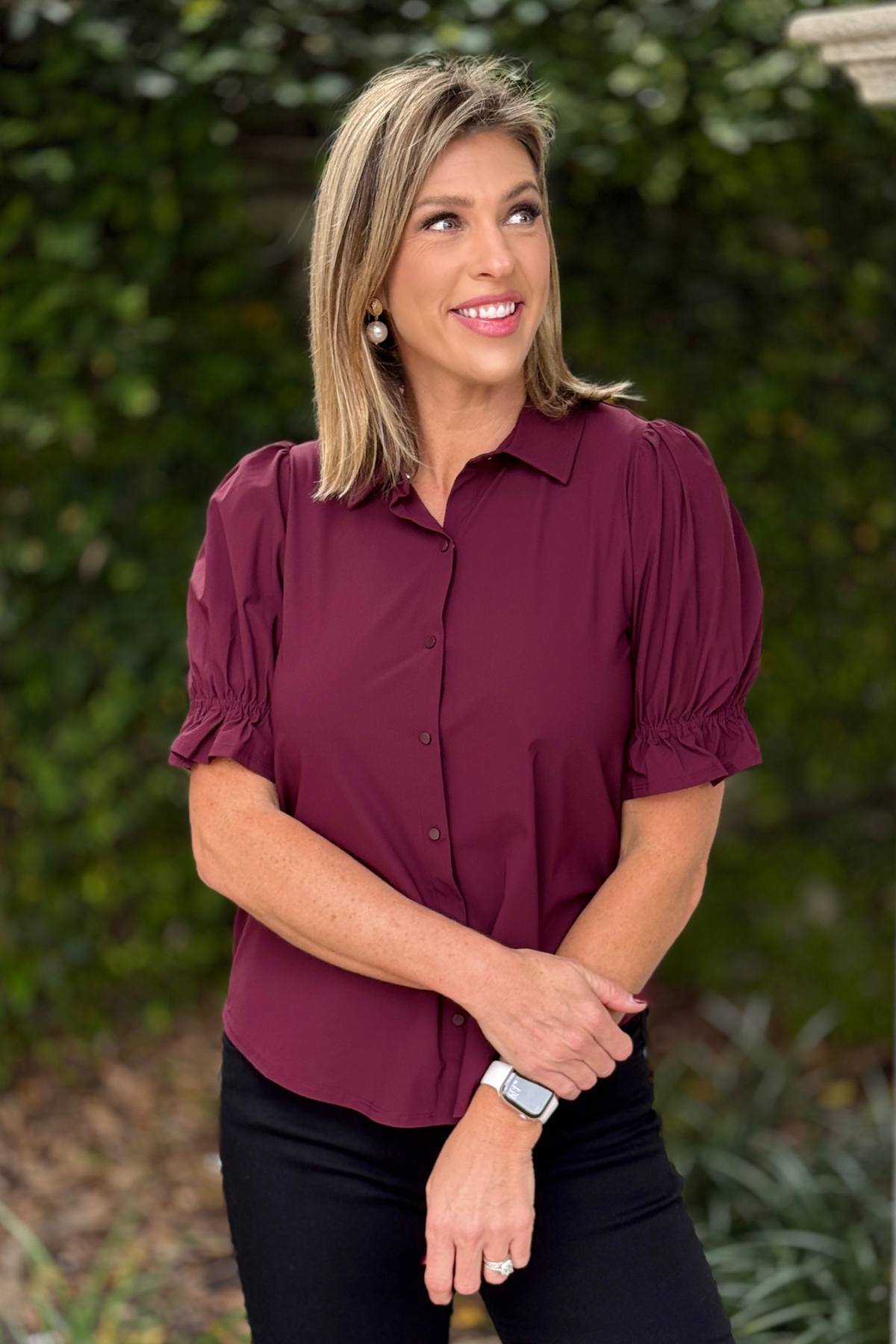 Liverpool oxblood knit blouse styled with black denim  