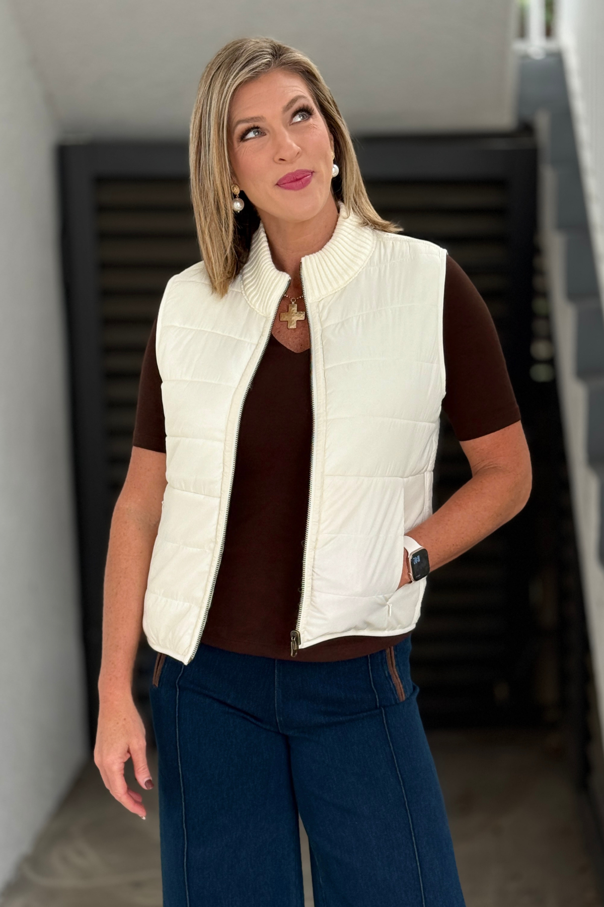 Cream Liverpool quilted sweater vest with ribbed collar and zip front