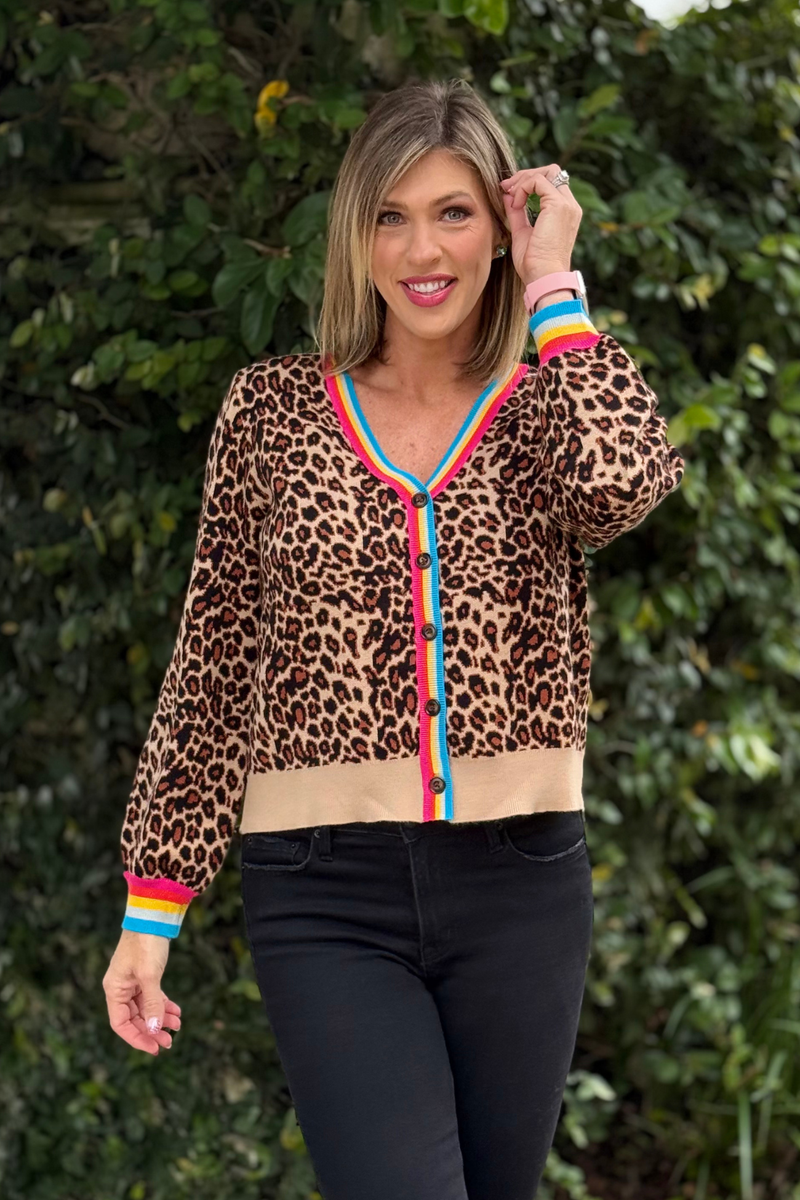 Close-up of leopard knit cardigan with rainbow detail