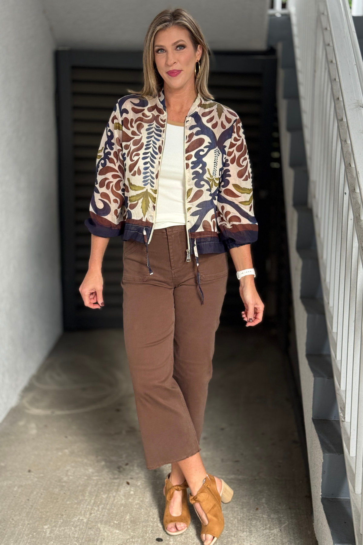 One size printed bomber jacket fits approximately sizes 2-12