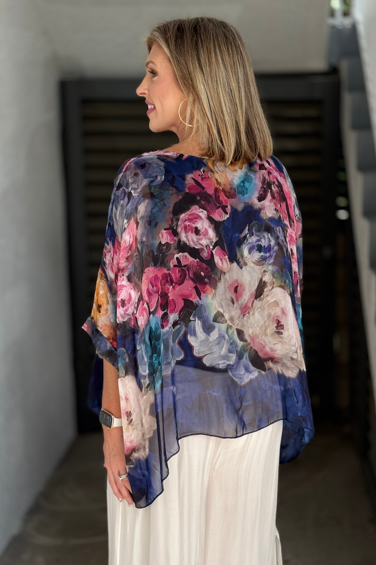 Navy multi rose print silk blouse styled with cream pants