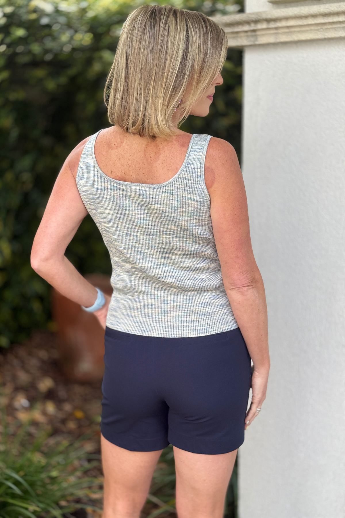 layering tank styled with shorts