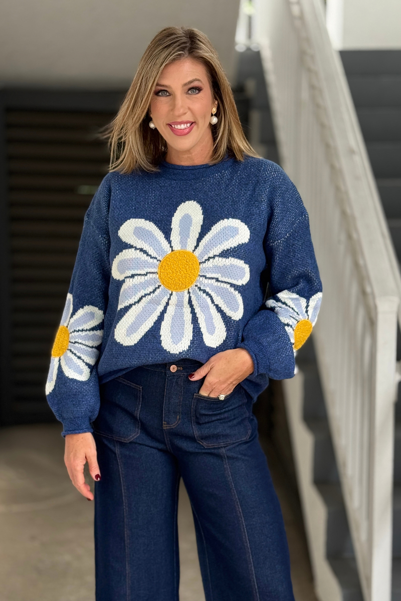 Blue oversized sweater with white daisy print