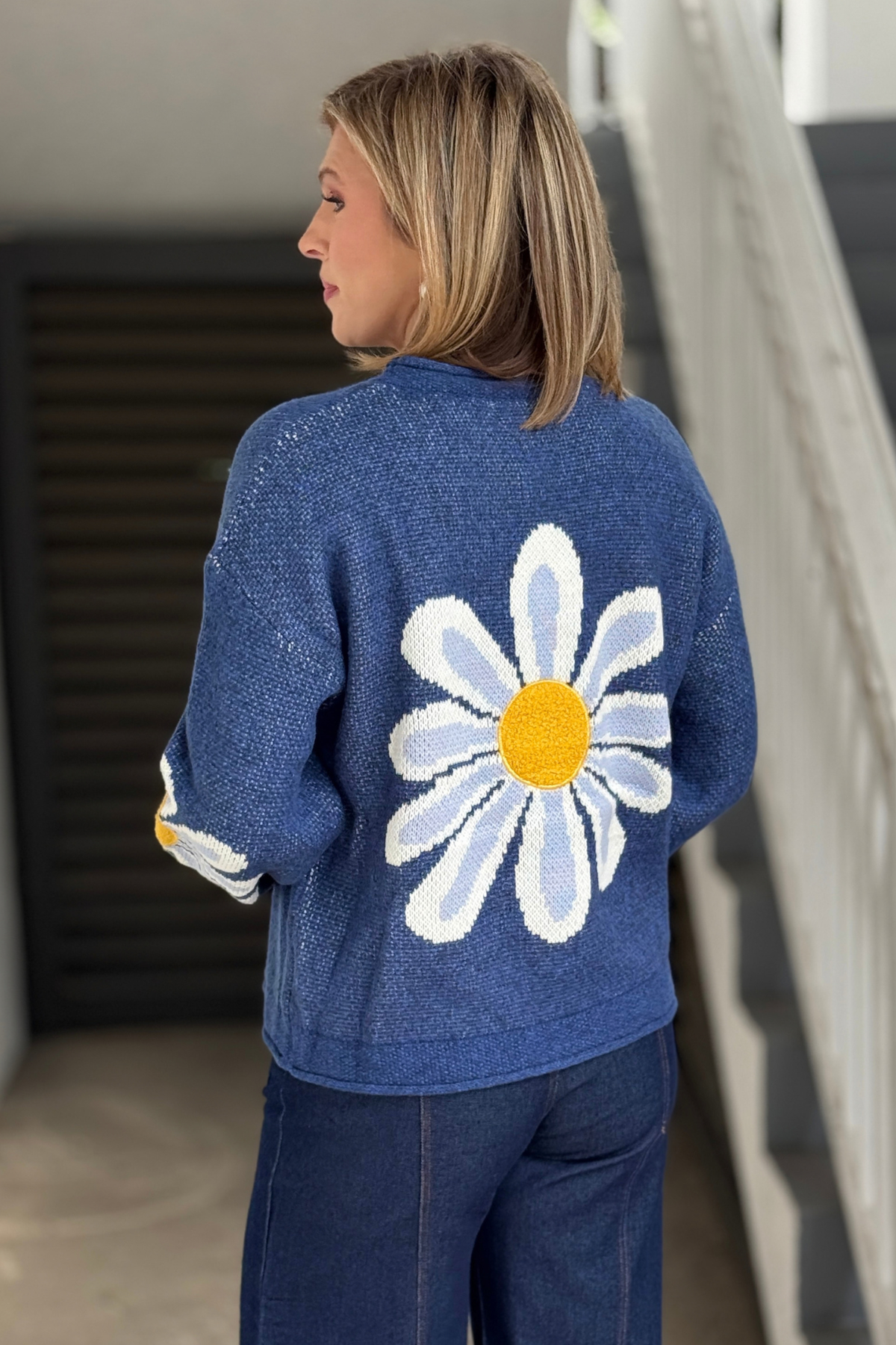 Relaxed fit daisy sweater with ribbed trim
Blue floral fall sweater with oversized daisies