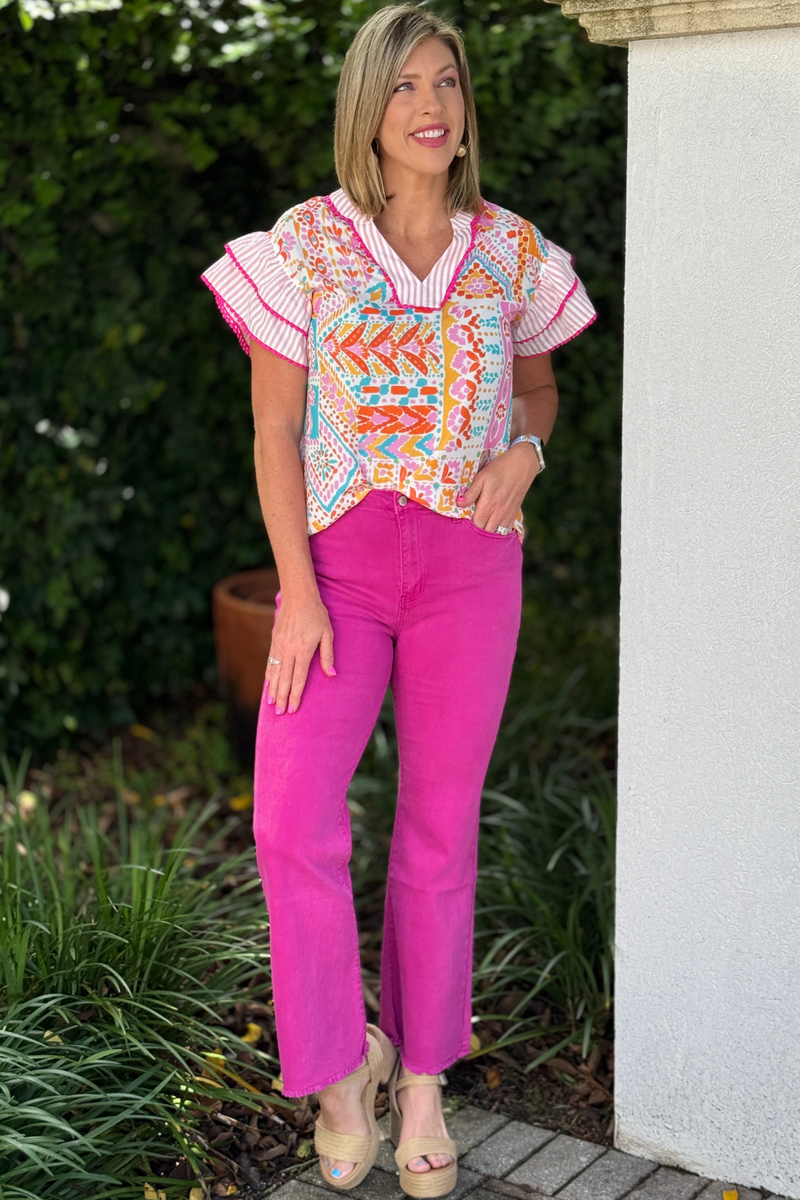 High rise pink boutique denim with raw hem