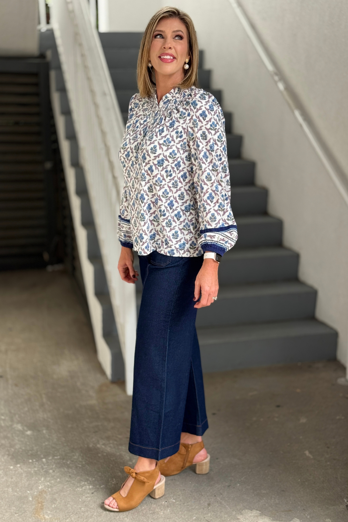 Lattice Crest Blue printed top with button front and elastic cuffs