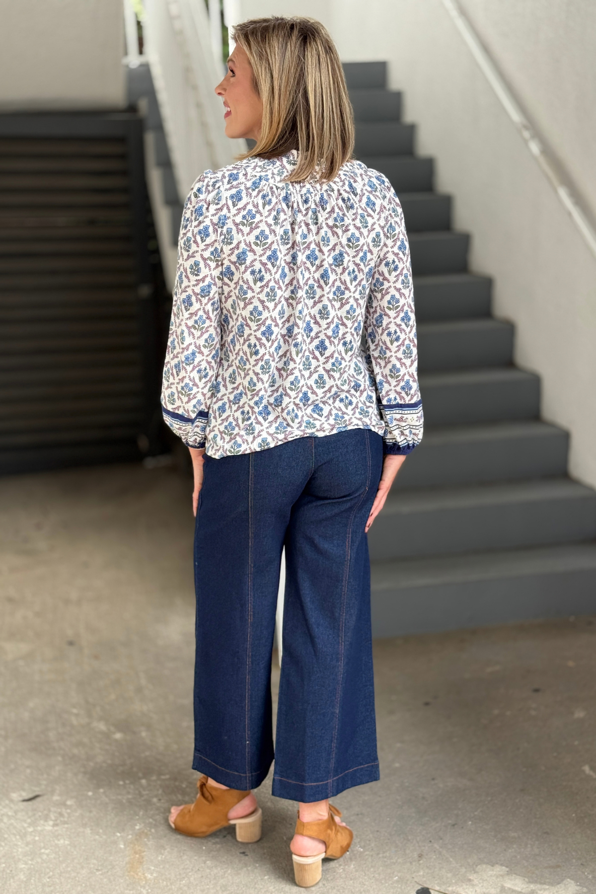 Women's fall floral blouse with blue border cuff detail
Mary Square Dawn Tee blue floral boutique top