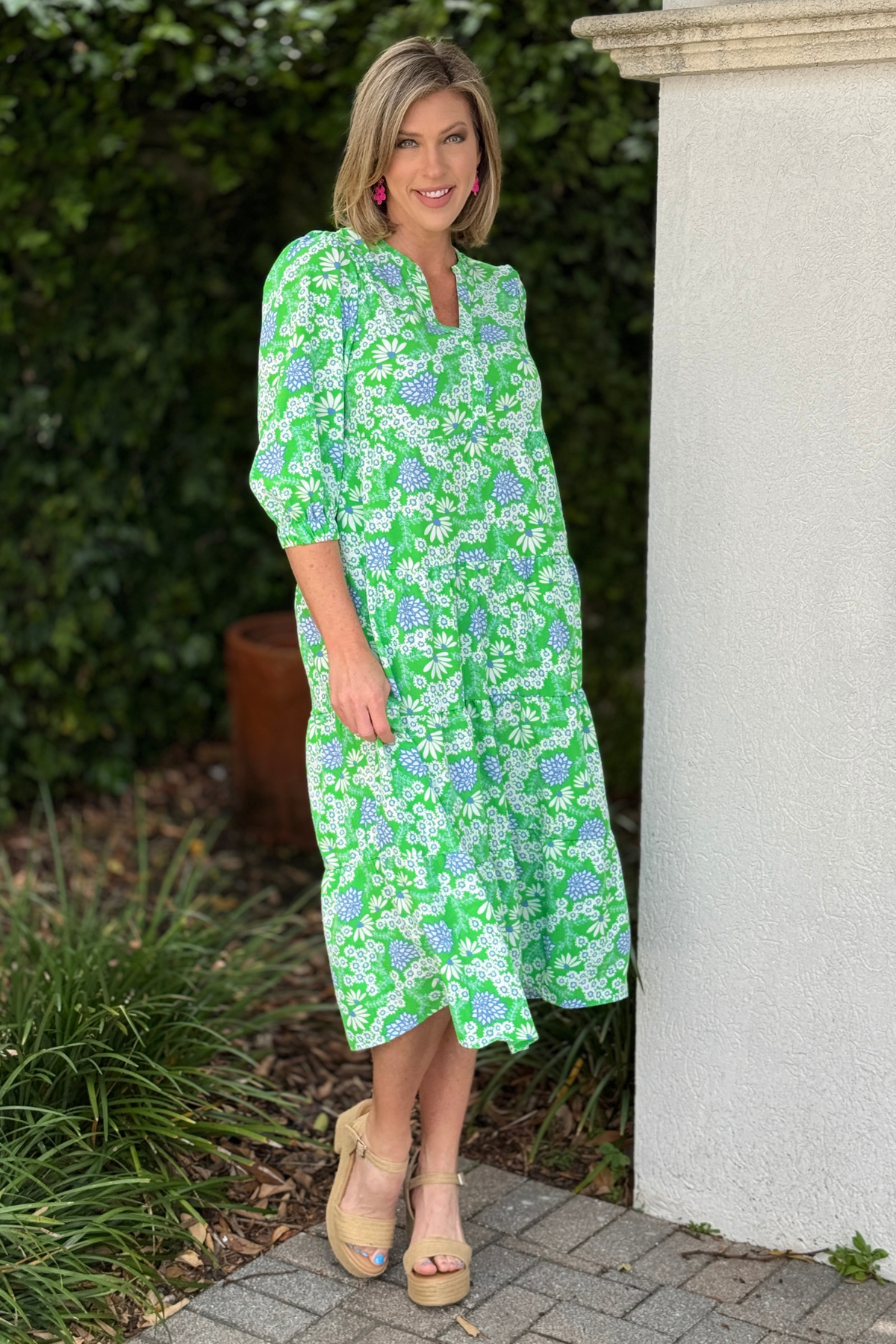 tiered green floral midi dress front view
