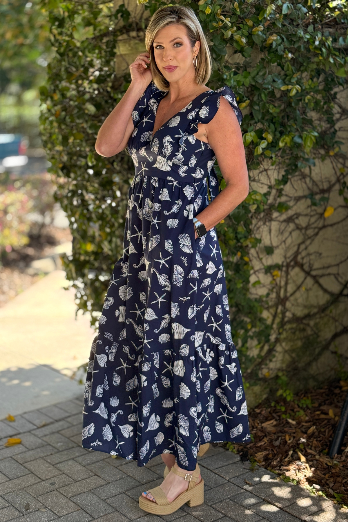 Lightweight beach maxi dress styled with wedges outdoors