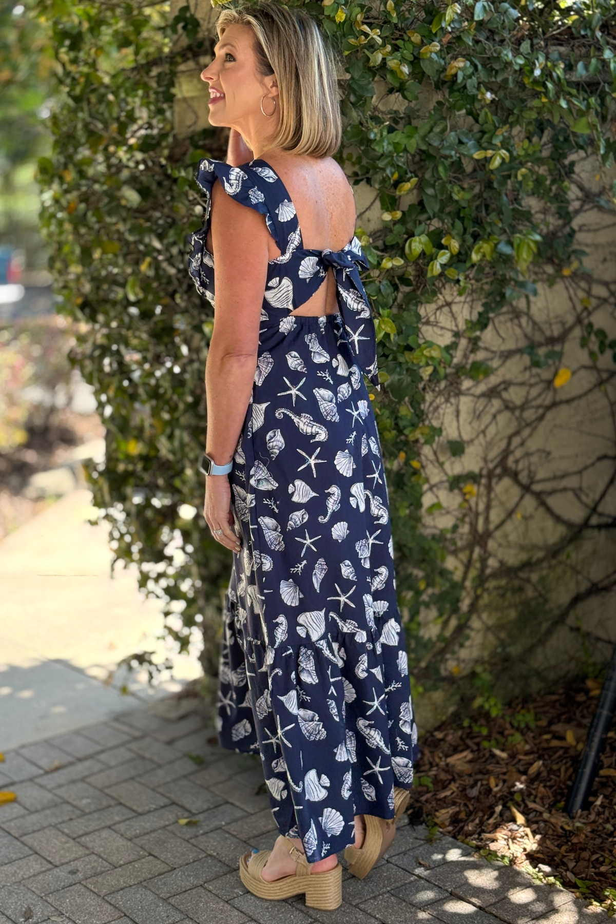 Summer navy maxi dress with ruffle sleeves and feminine fit