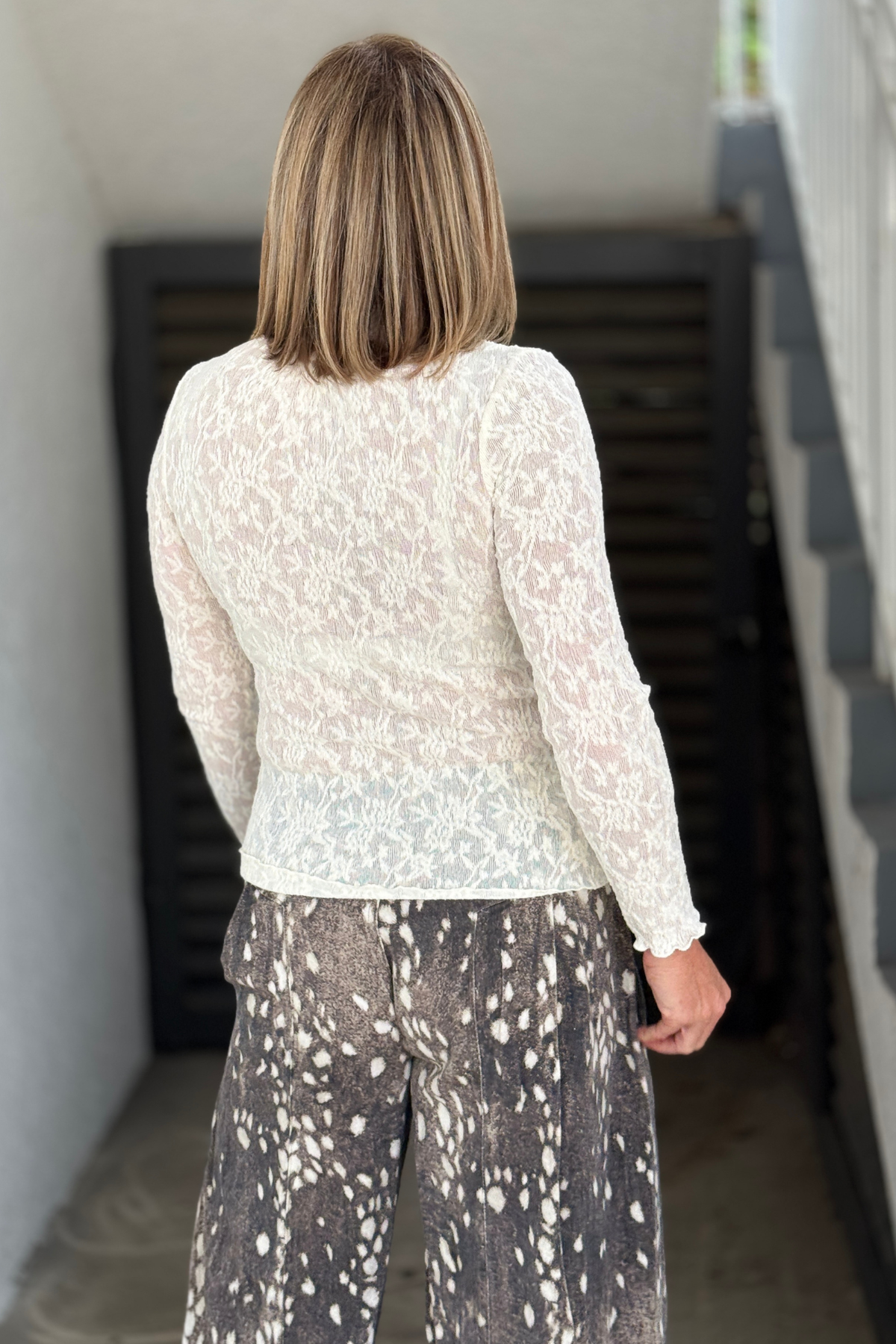 Women’s ivory mock neck long sleeve boutique top