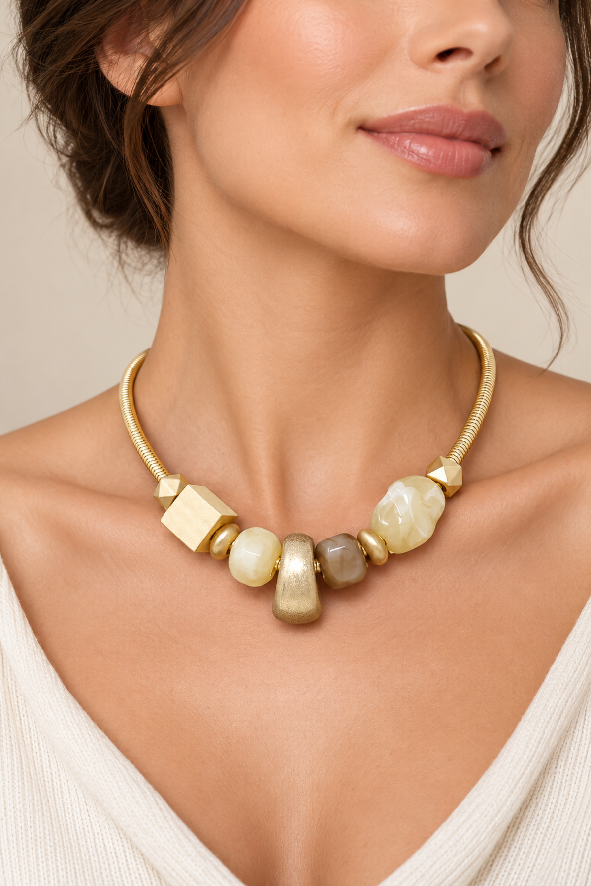 Geometric bead statement necklace with cream taupe and gold accents