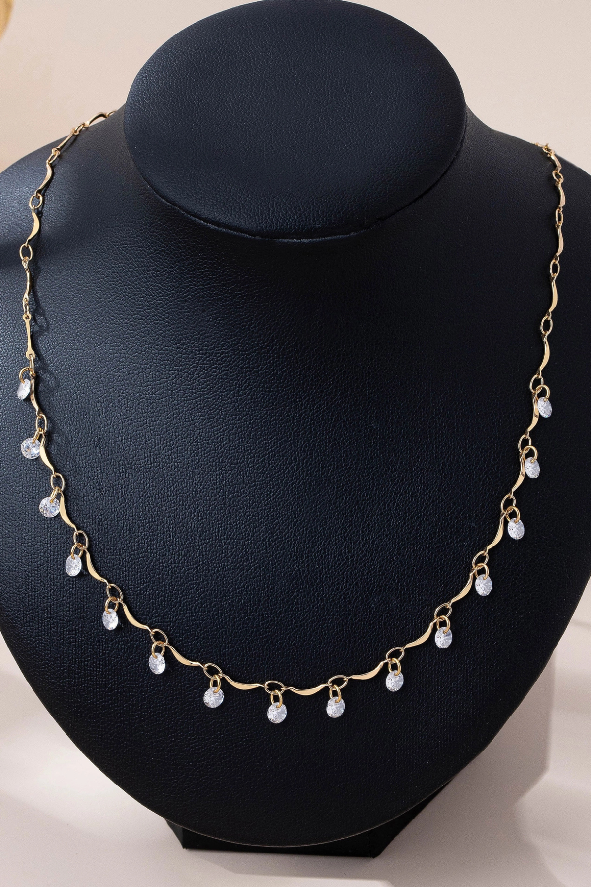 delicate chain necklace with spaced crystal details