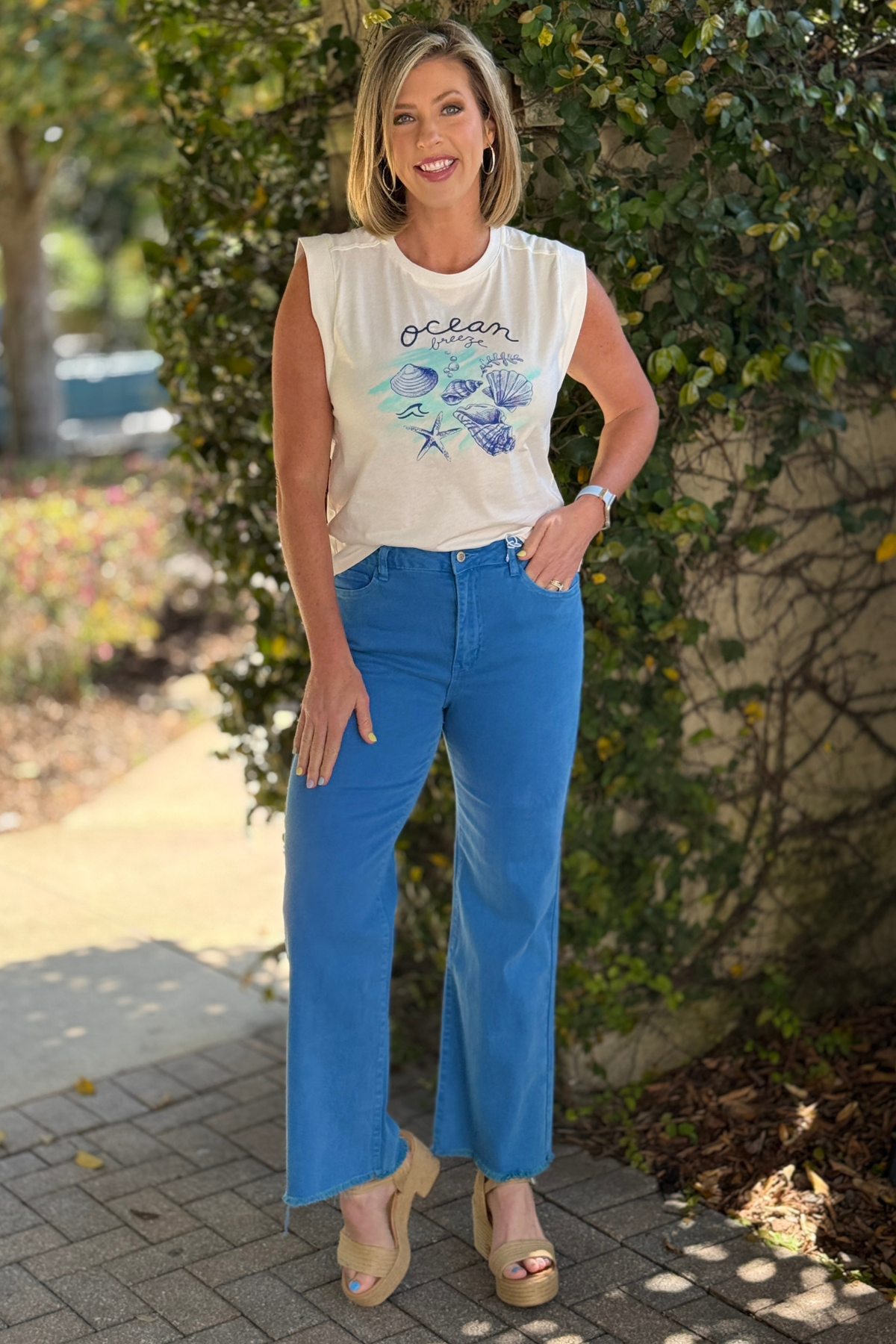 High rise wide leg jeans in ocean blue with frayed hem