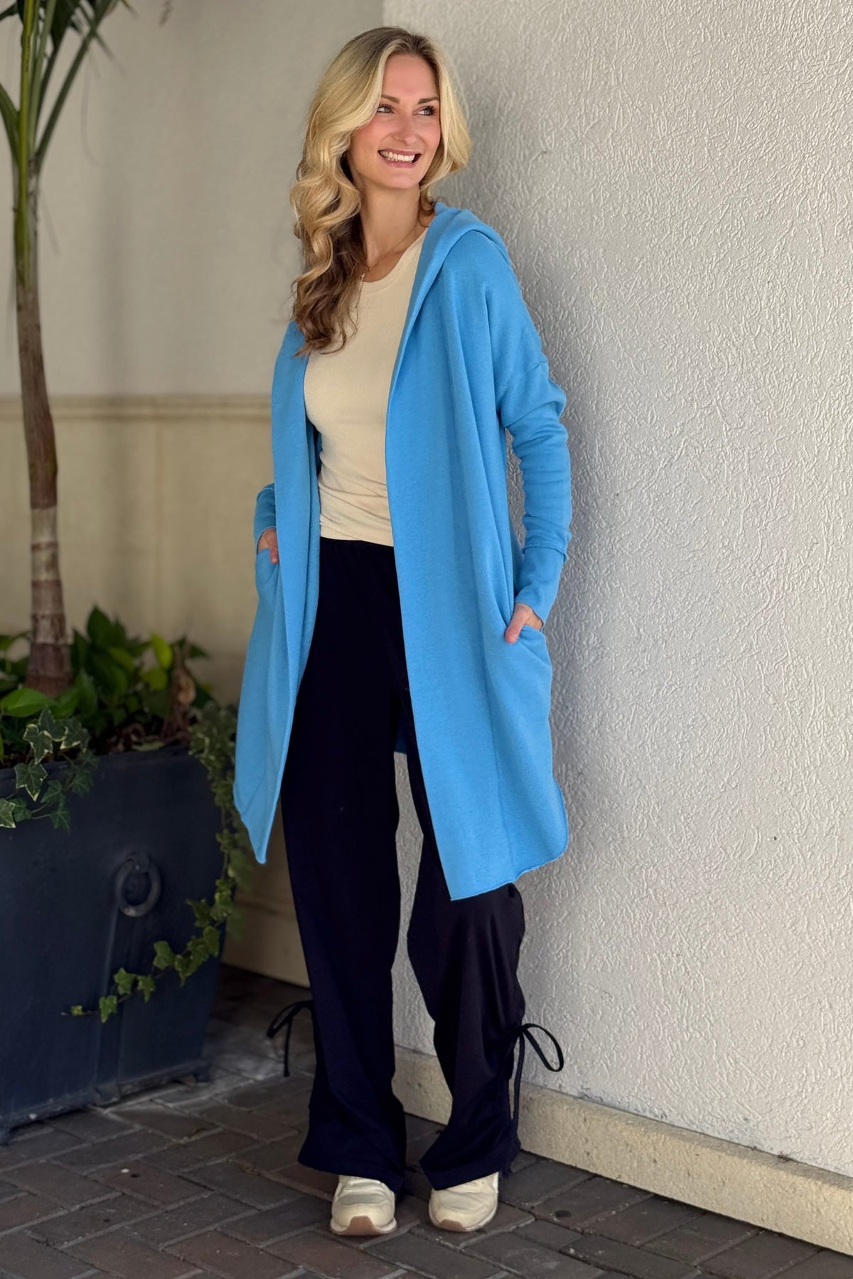 Women’s ocean blue cardigan with hood and wide cuff sleeves