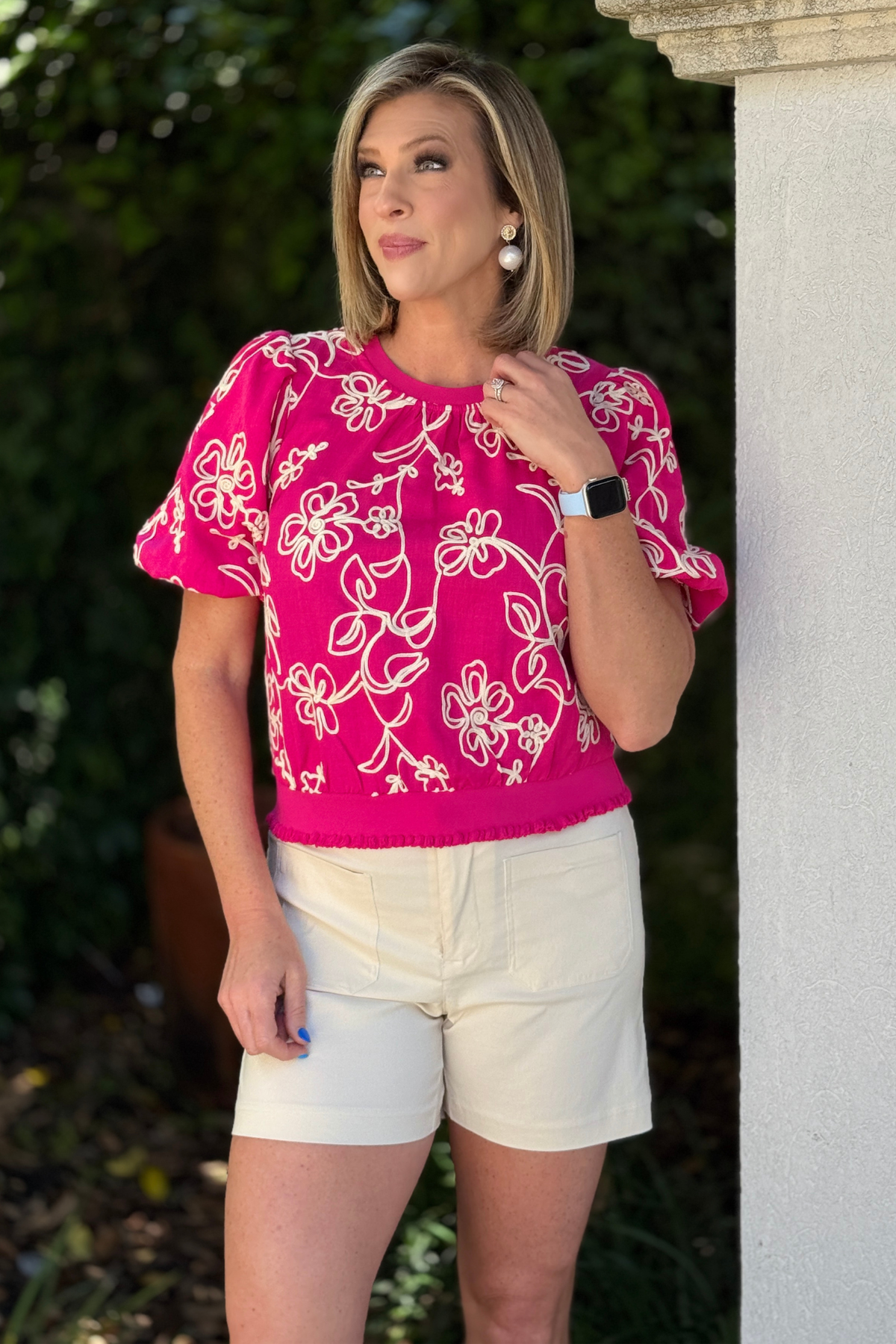 detailed embroidery on pink boutique blouse