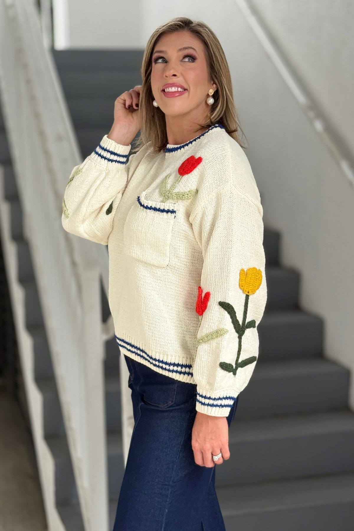Cream embroidered sweater with blue contrast trim