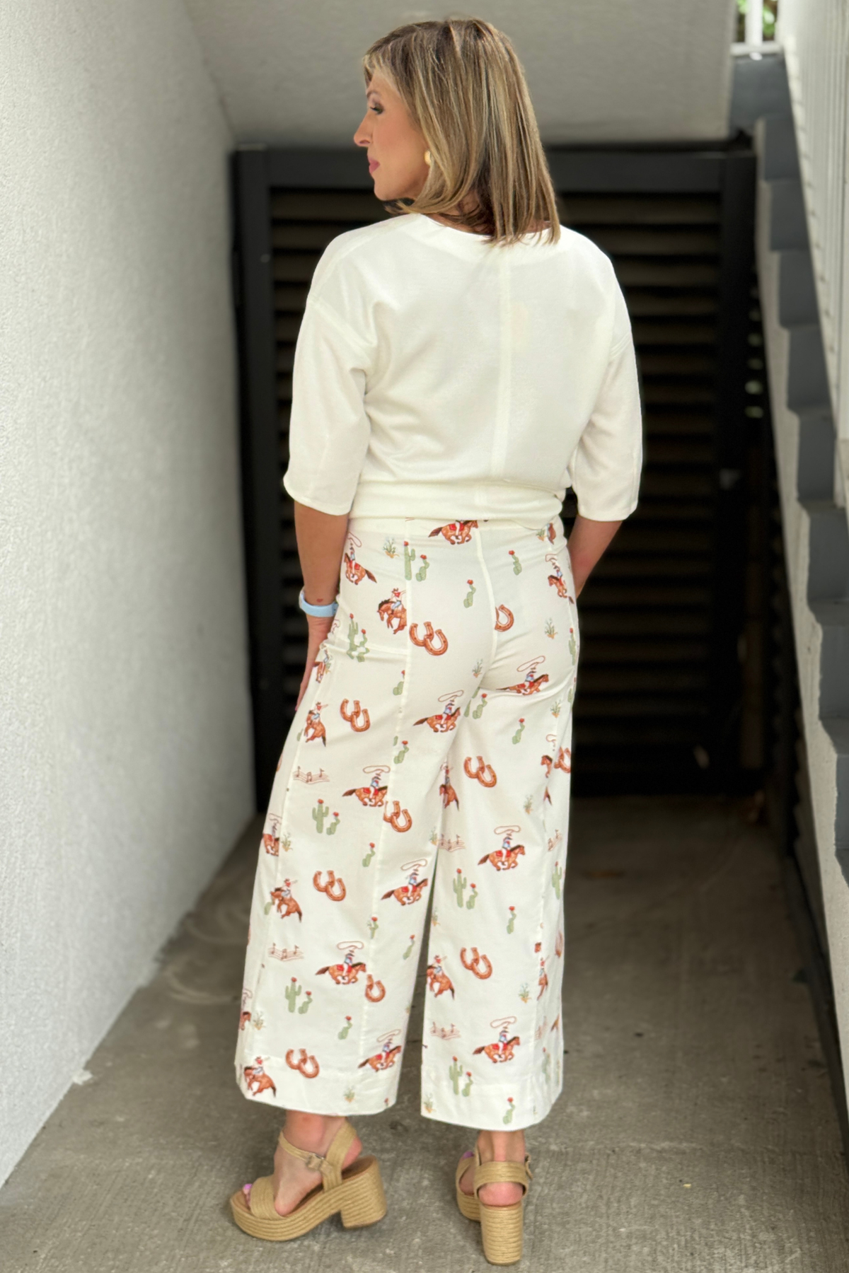 Front view of western cowboy print trouser pants
