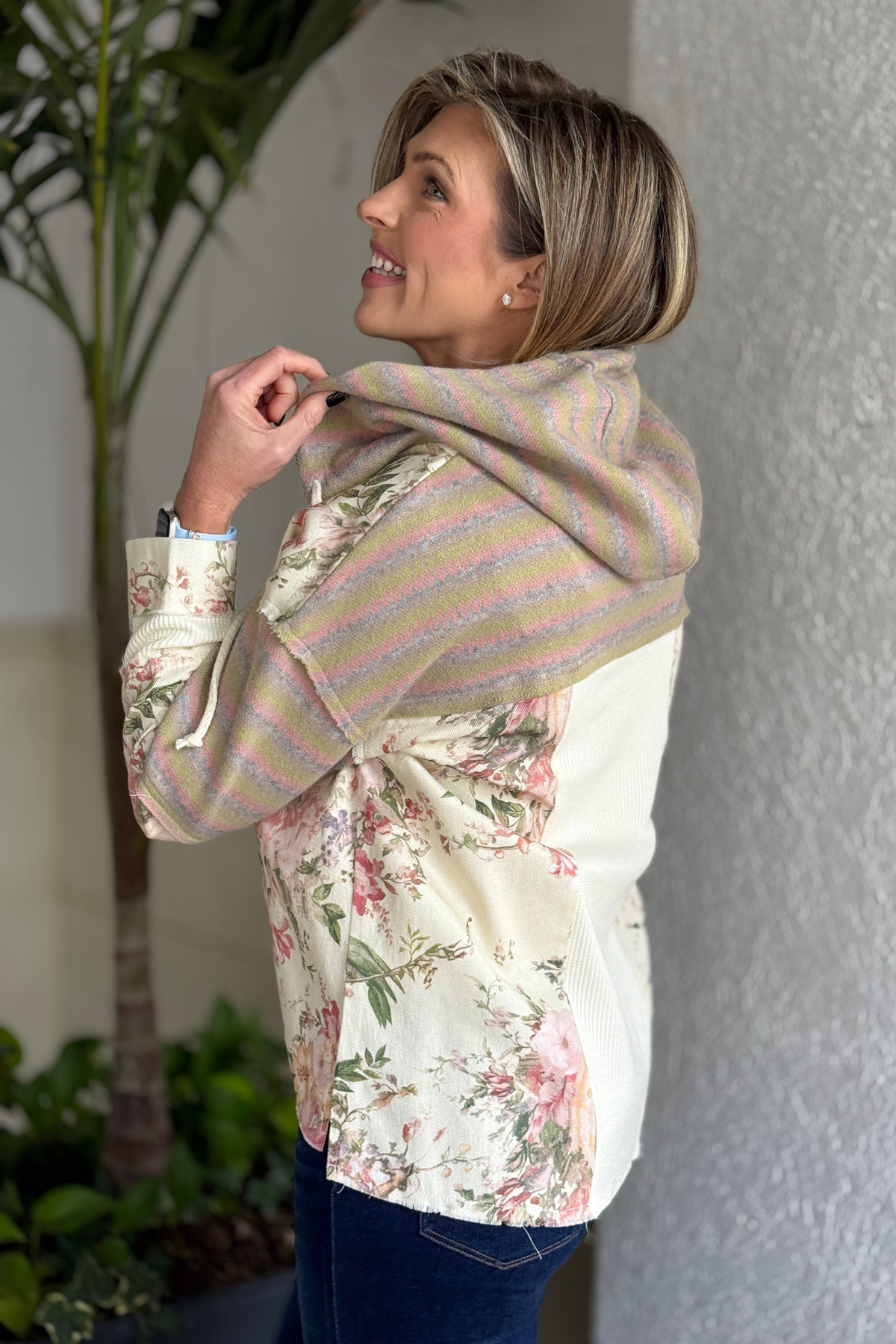 Close up of lace applique detail on floral patchwork jacket