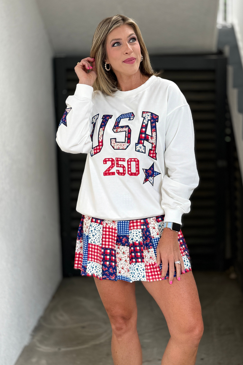 Relaxed fit patriotic pullover with floral details