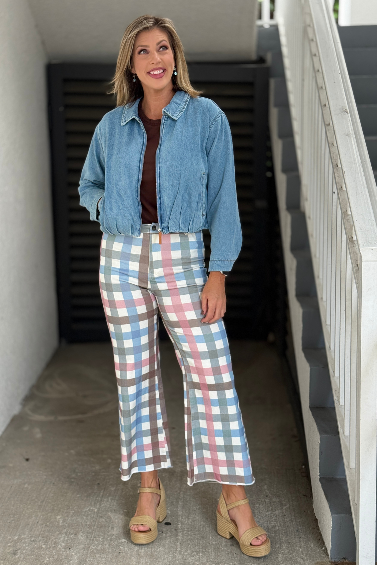 Multi plaid cropped pants styled with pink Henley top