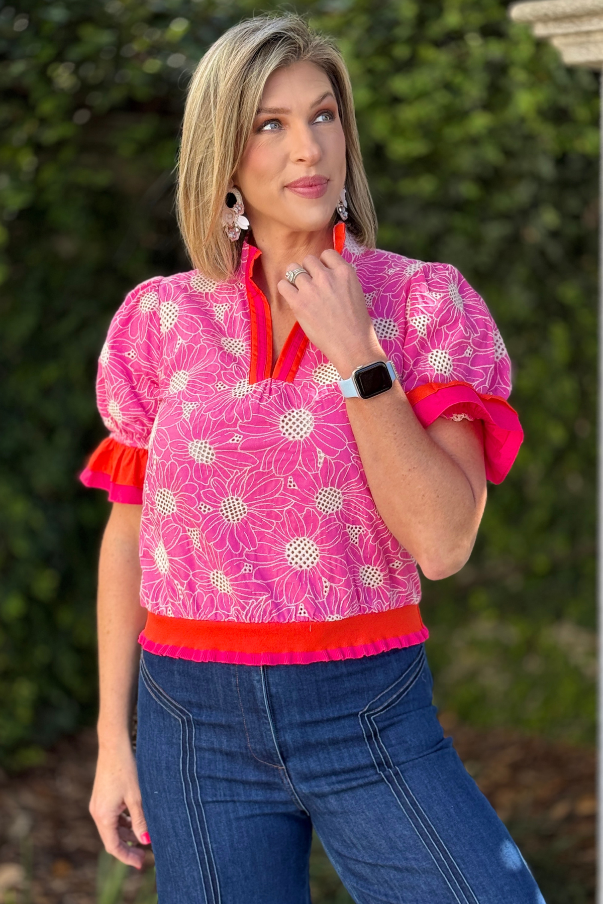 Women’s Masters golf tournament outfit top in pink floral