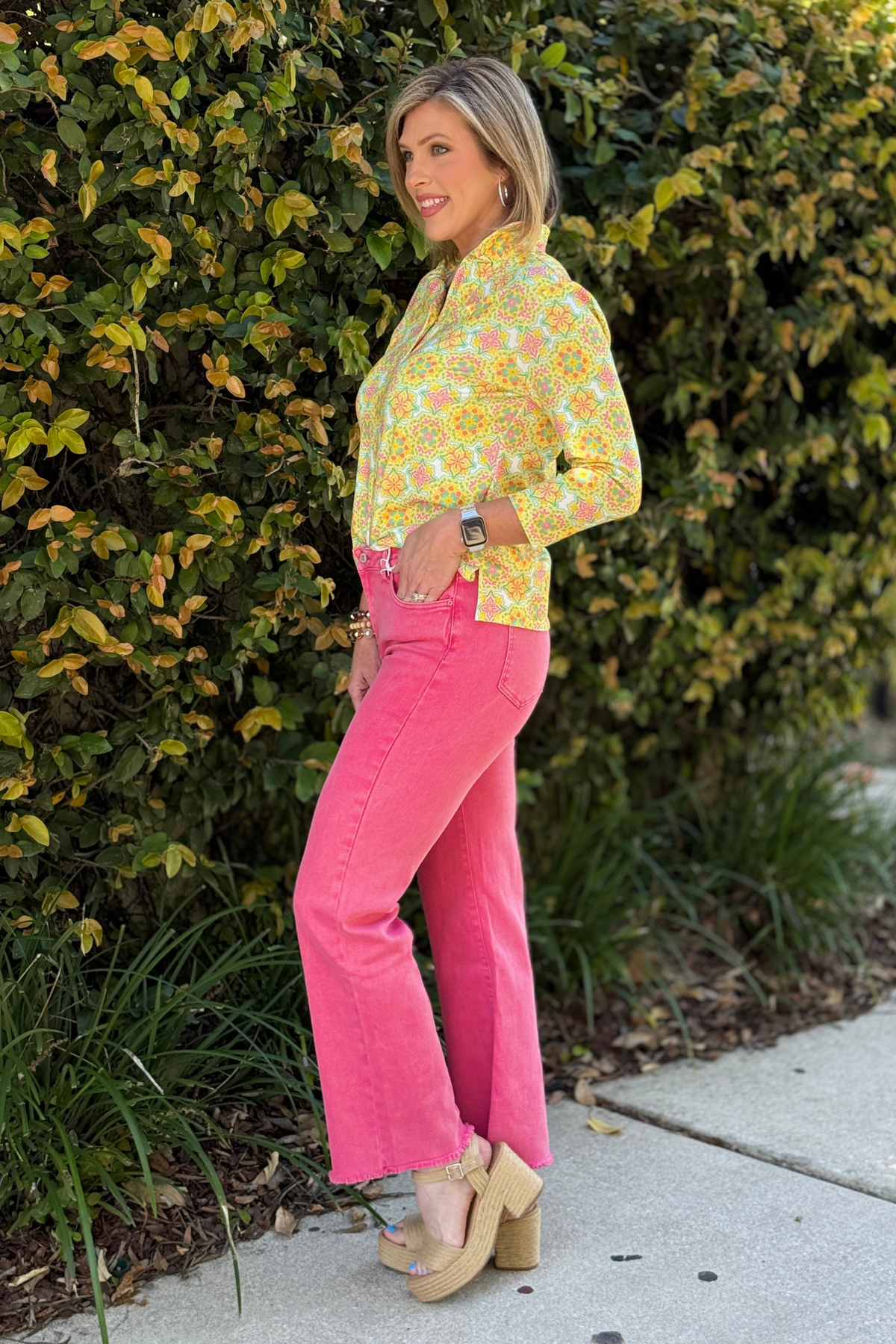 pink high rise wide leg denim styled with blouse