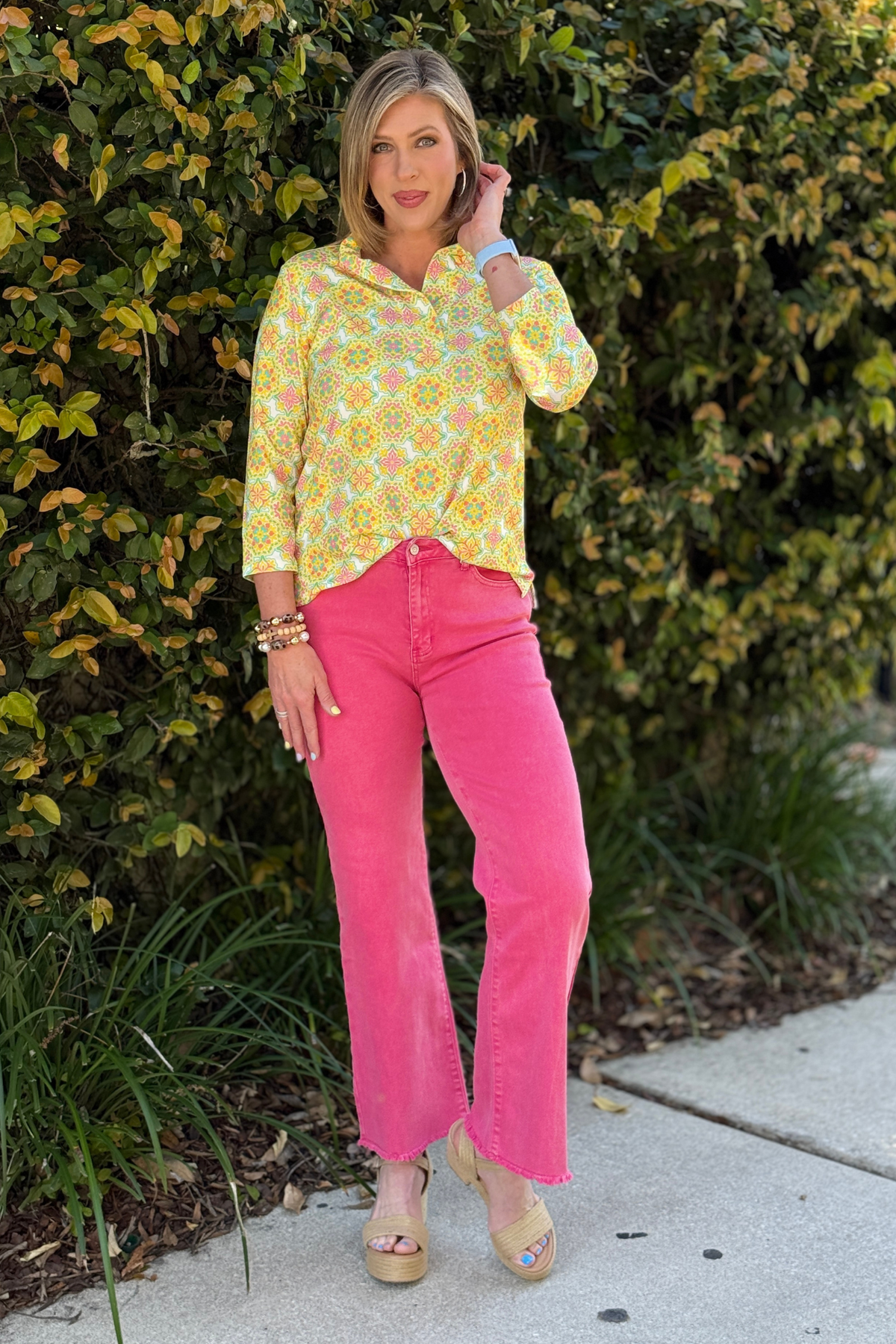 fuchsia wide leg jeans with frayed hem front view