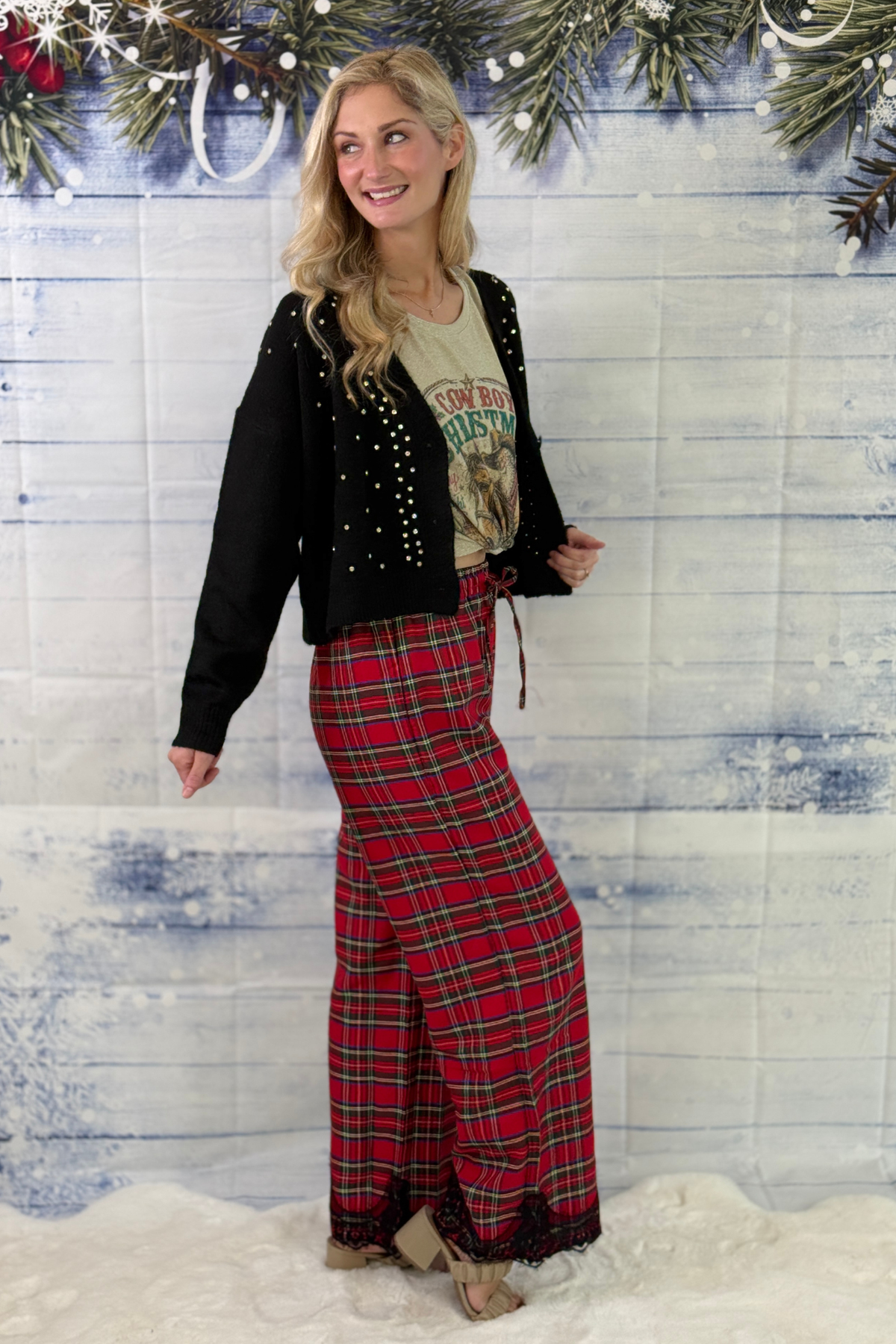 Red multi plaid pants styled for a holiday outfit