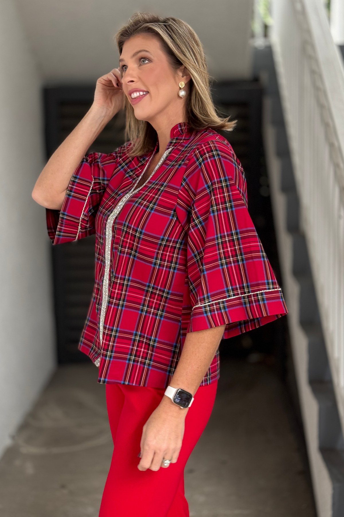 Women’s festive plaid top with rhinestone sleeve details