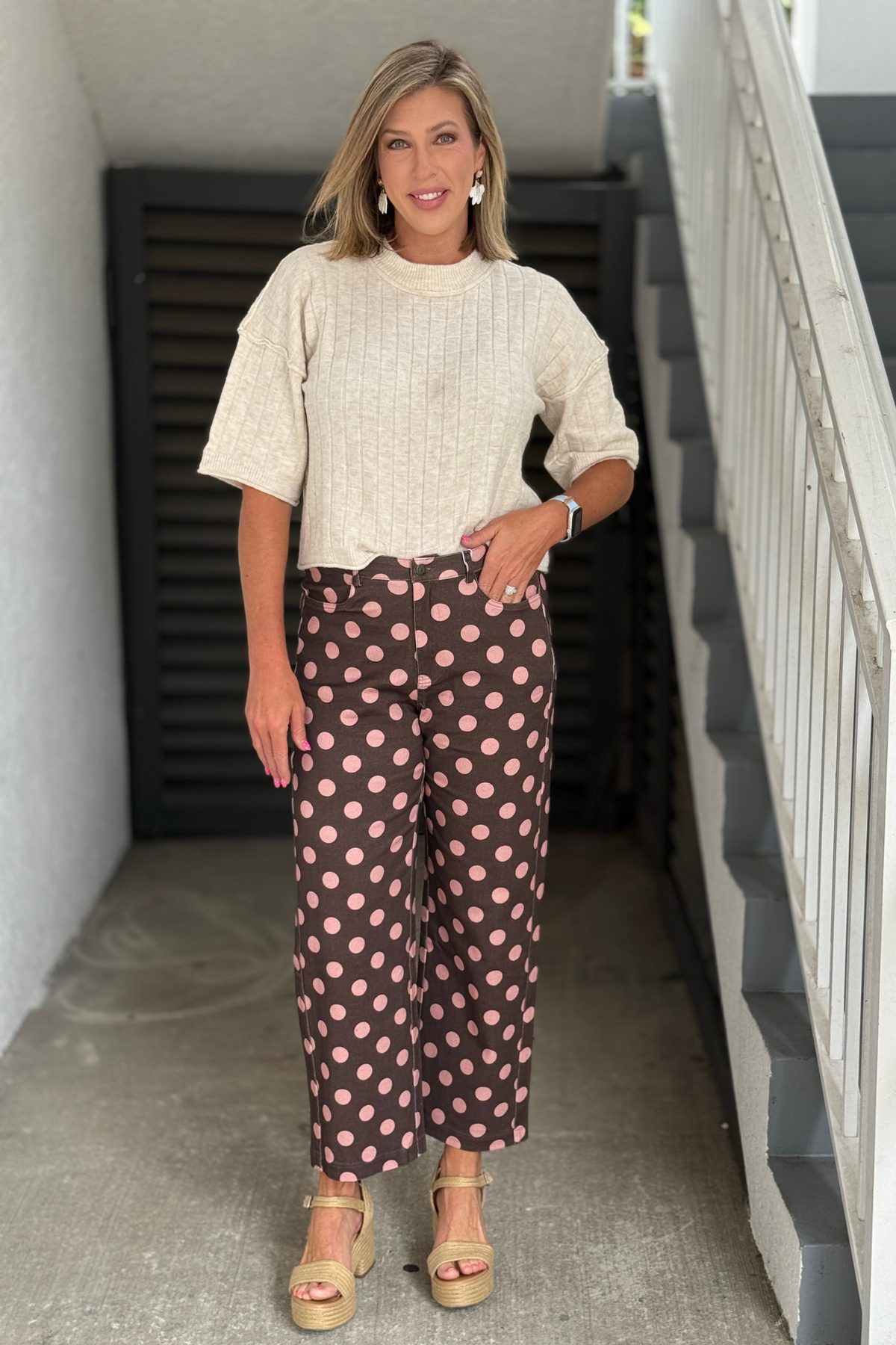 Front view of polka dot cotton twill pants