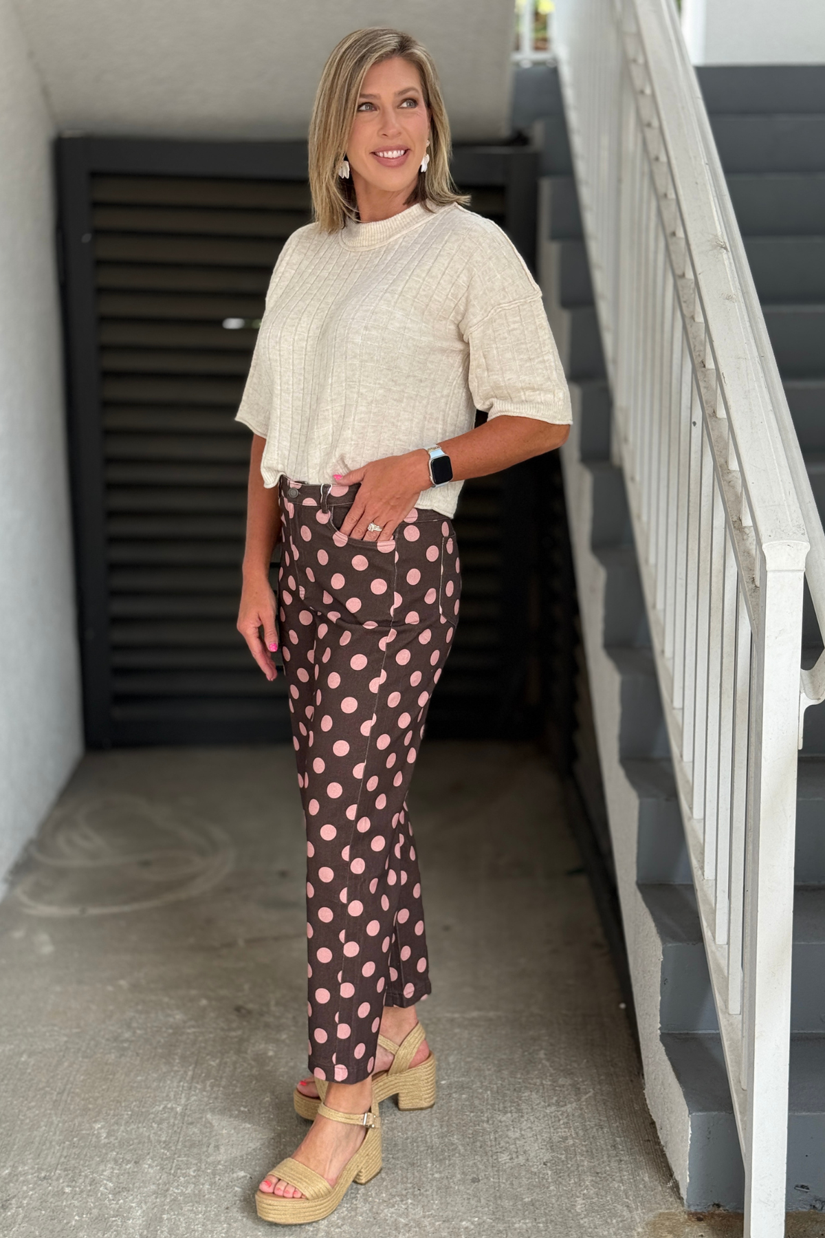 Side view of ankle length polka dot pants
