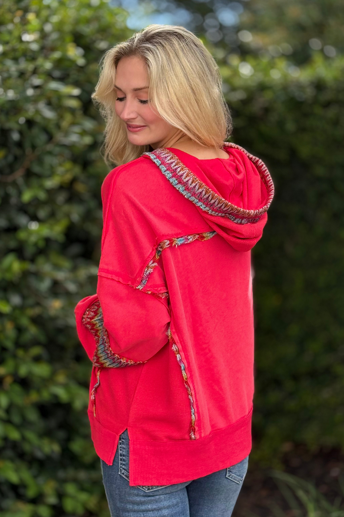 Close-up of knit contrast trim on hood and sleeves – Daisy Patch Mineral Wash Hoodie