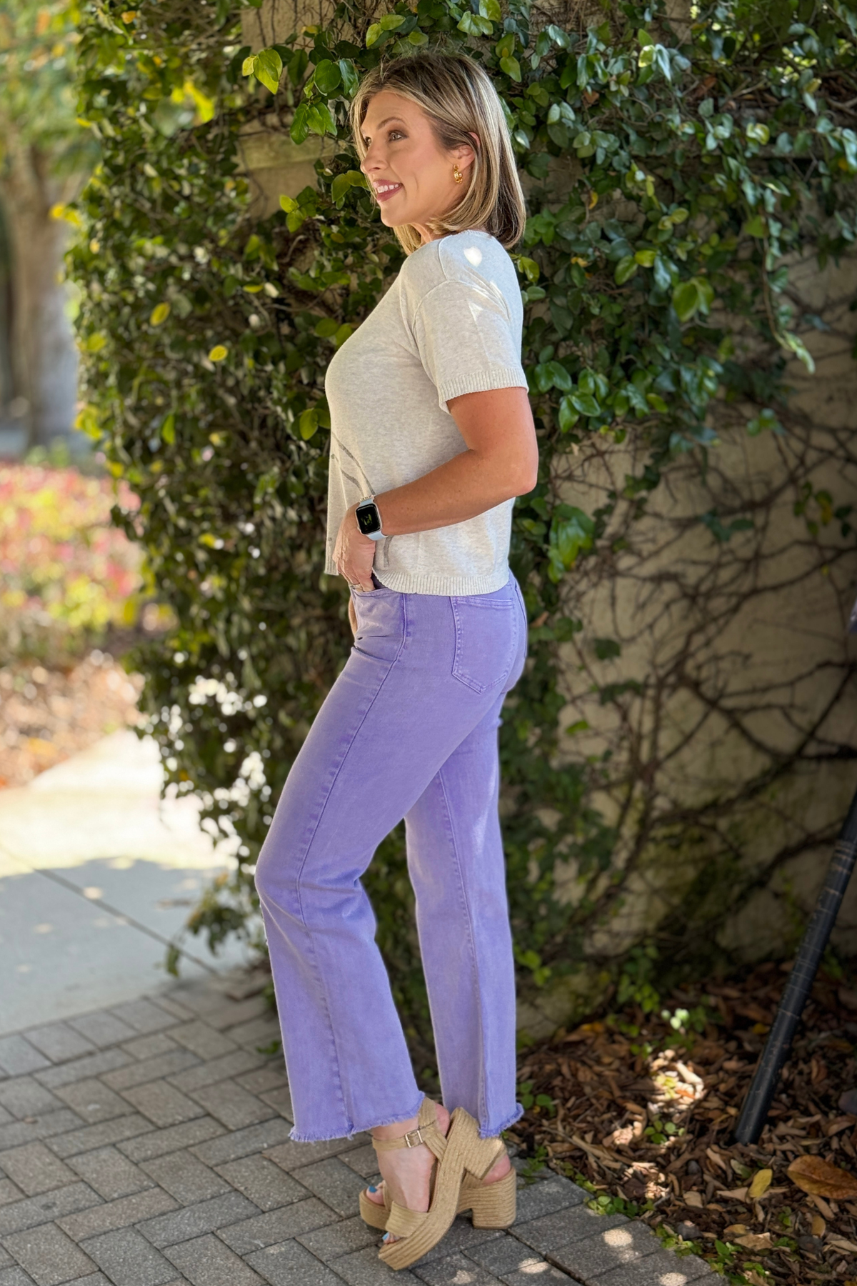 pastel purple denim jeans with frayed hem