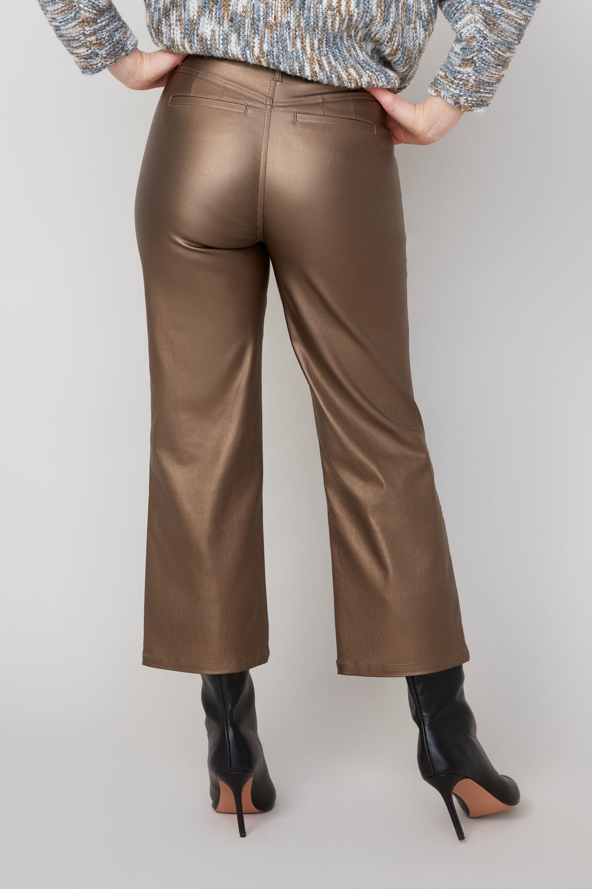 Close-up of Renuar Waxed Stretch Pants copper waxed fabric detail