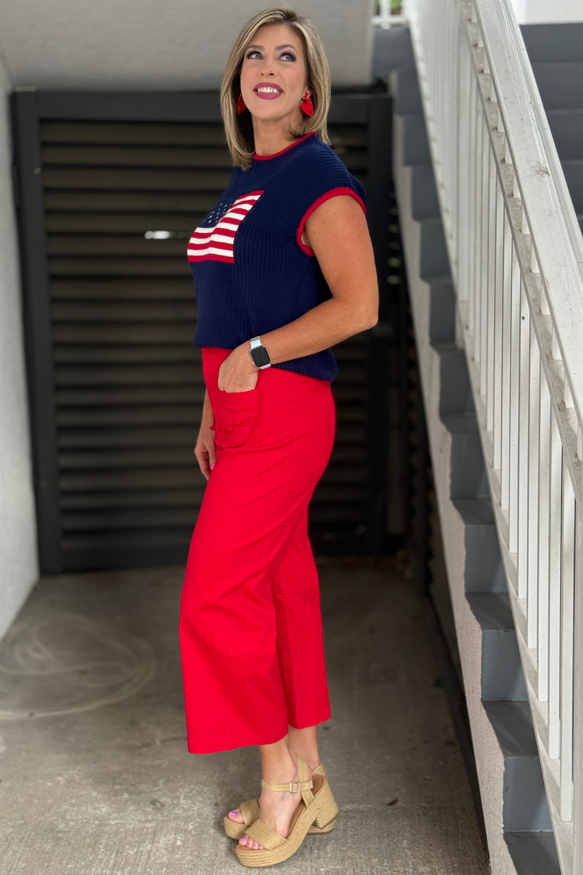 Red boutique pants with feminine scalloped pockets