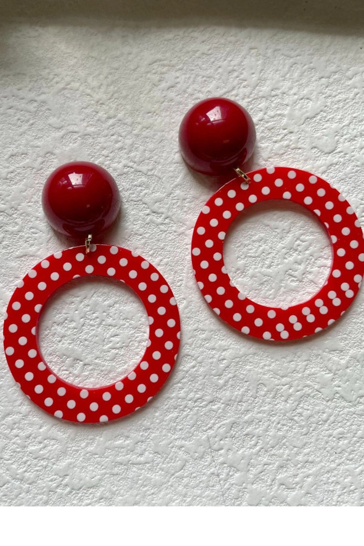 Red polka dot statement hoop earrings with glossy stud top