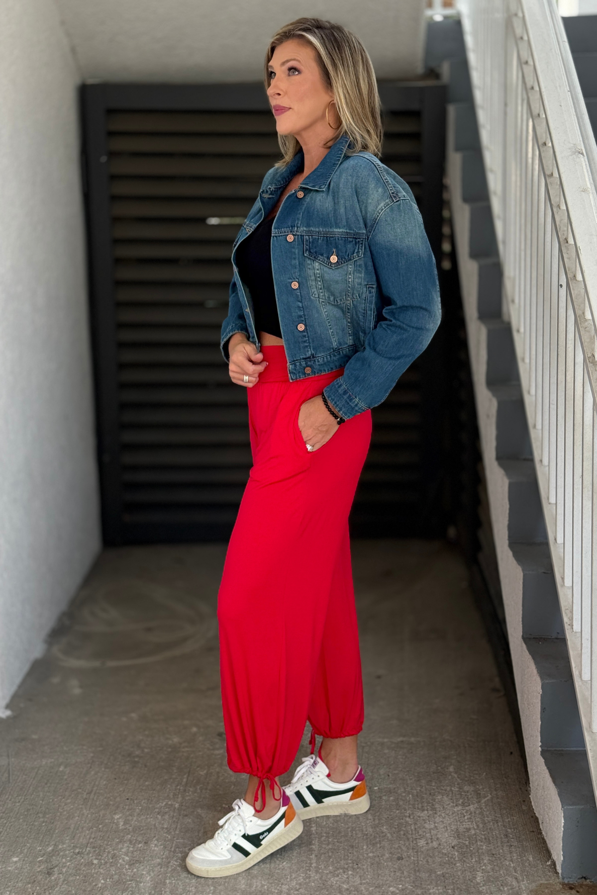 High-rise red crossover waist pants with relaxed straight-leg fit