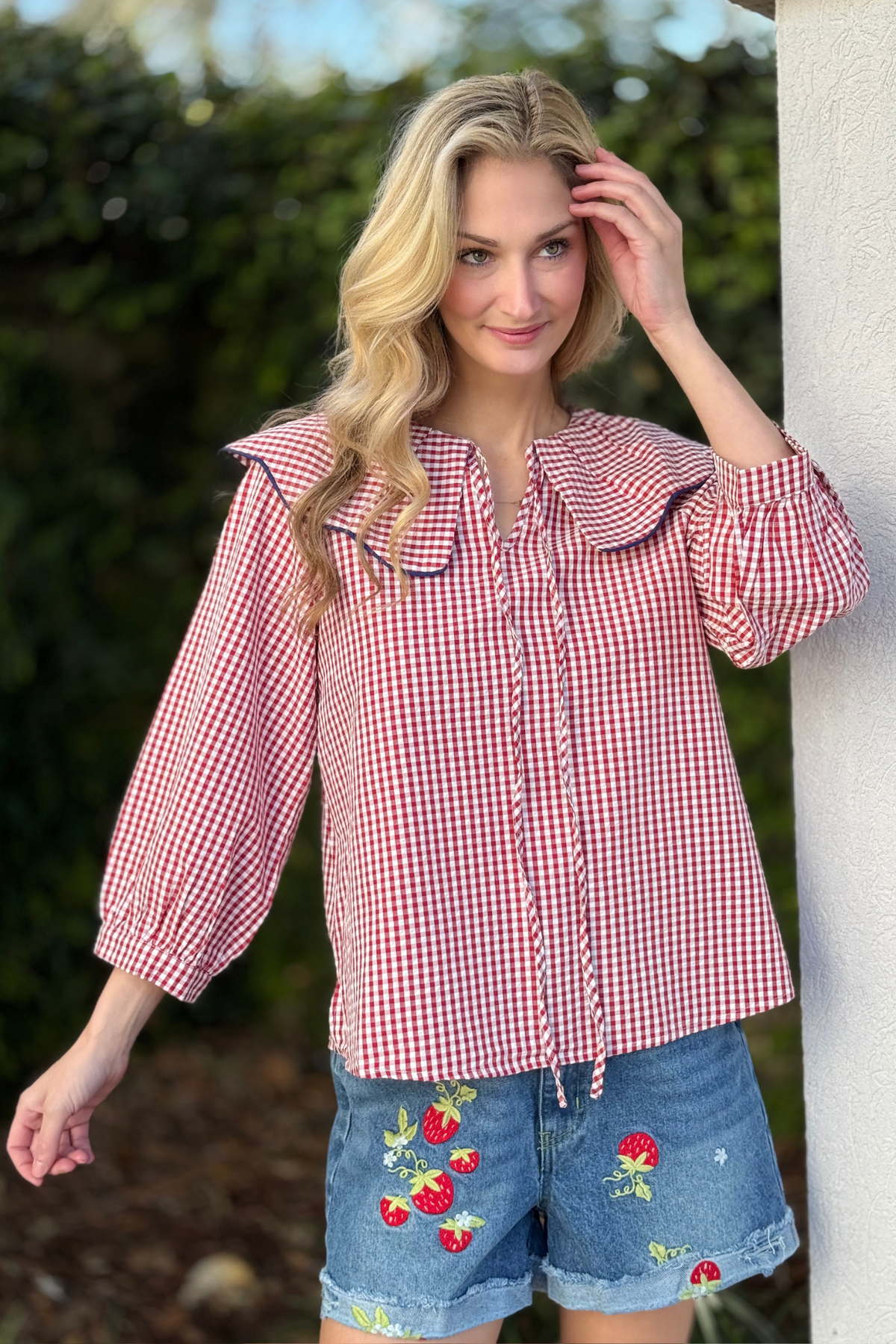Wide collar gingham blouse with pintuck detail close up