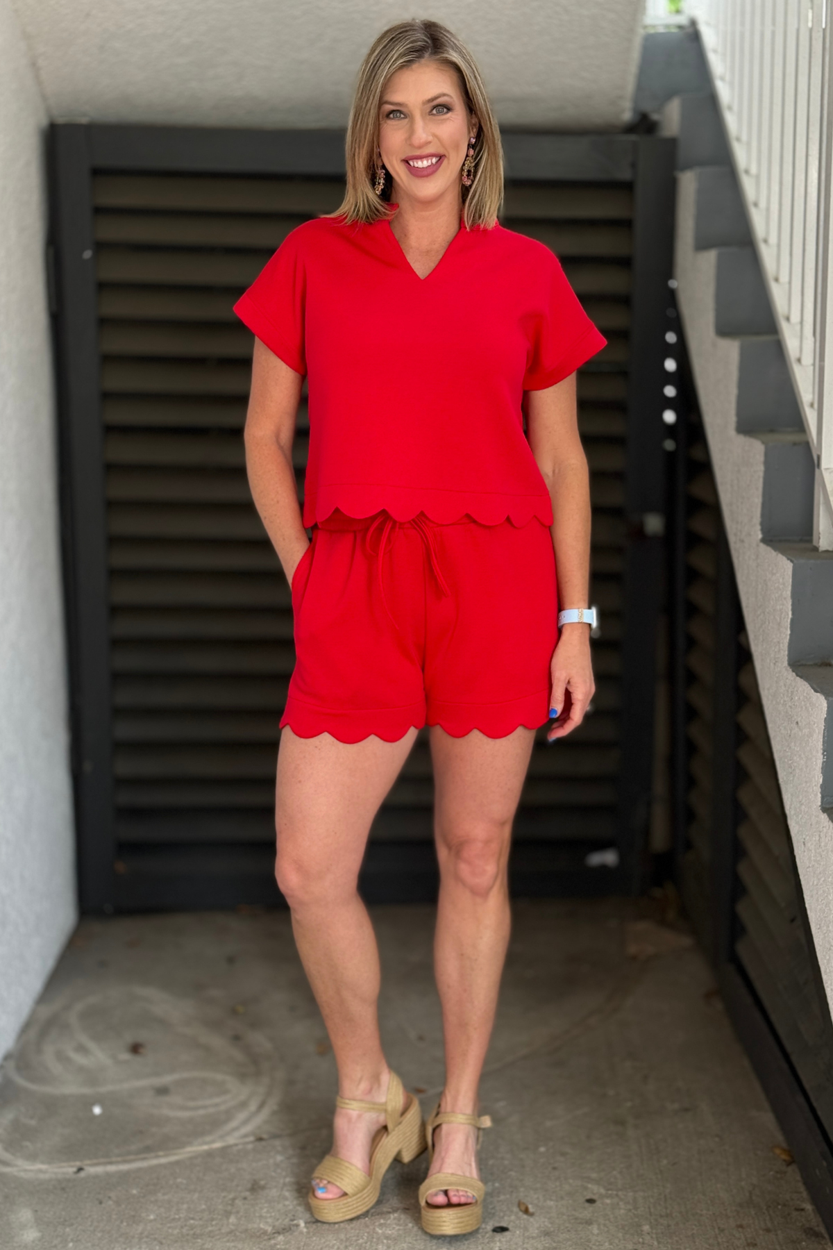 red shorts set with scallop hem detail