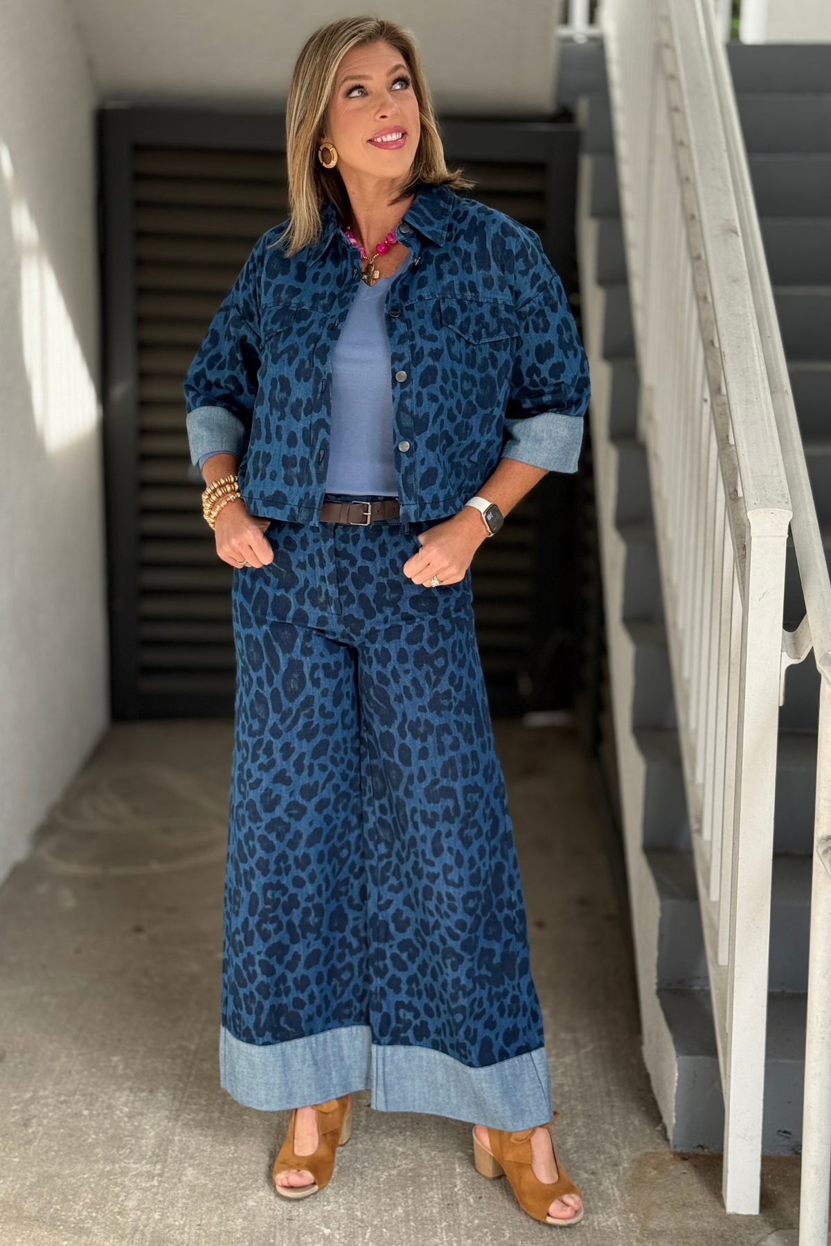 Women’s indigo denim pants with tonal leopard print