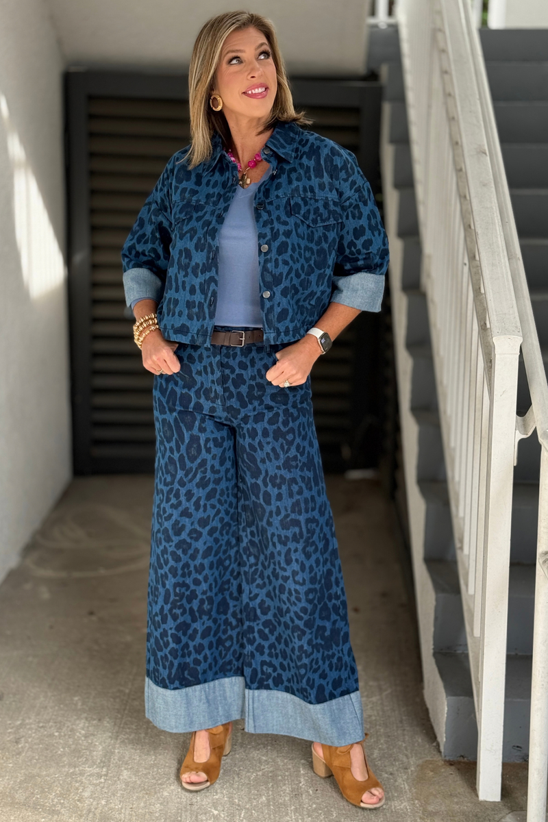 Women’s indigo denim pants with tonal leopard print