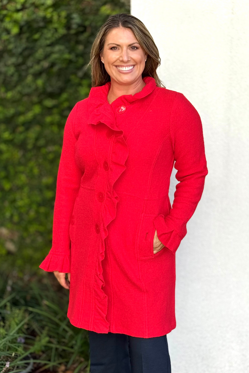 Close-up of ruffle detailing on red lightweight jacket