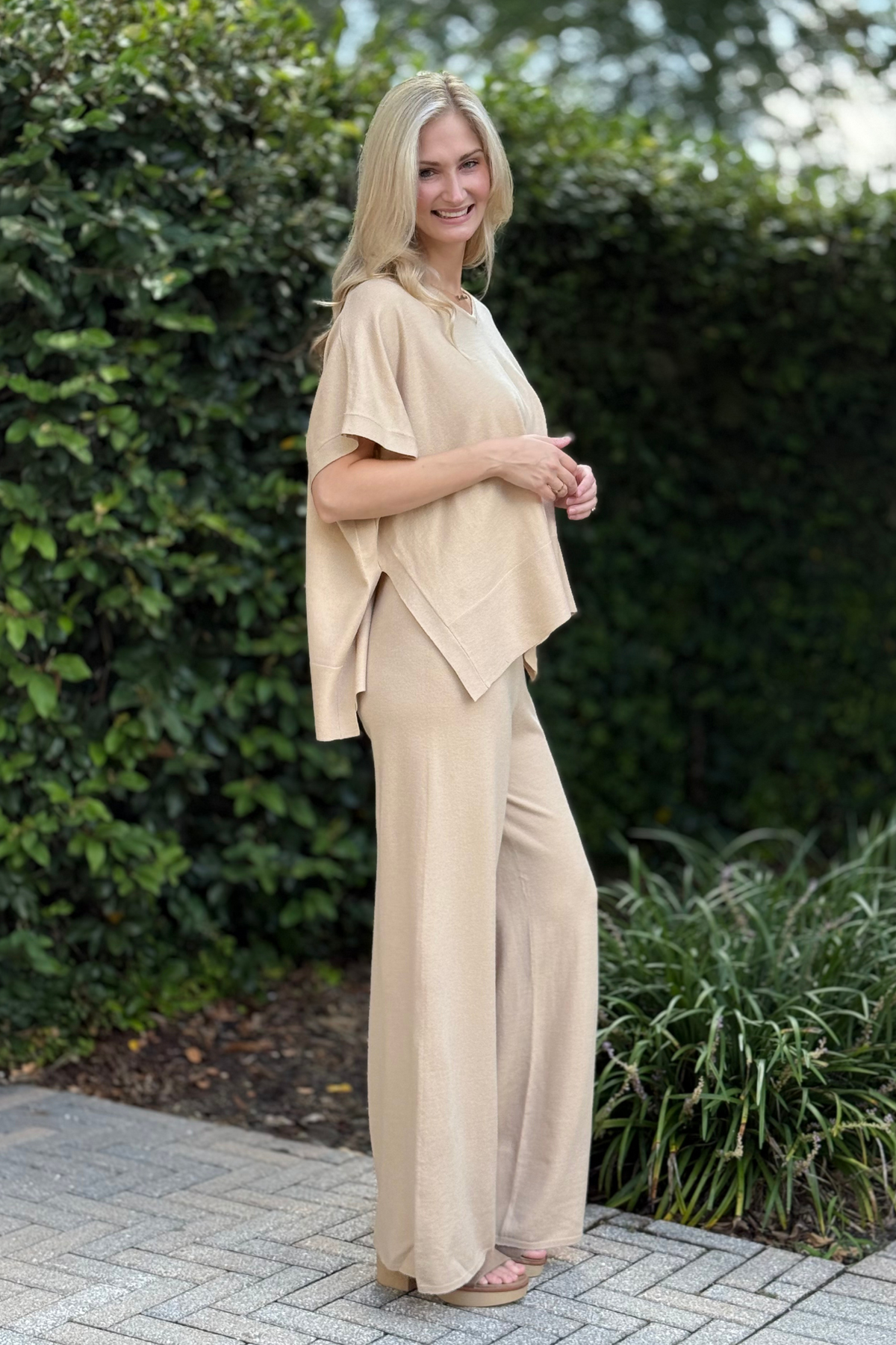 Close-up of pull-on elastic waistband and soft knit fabric in tan