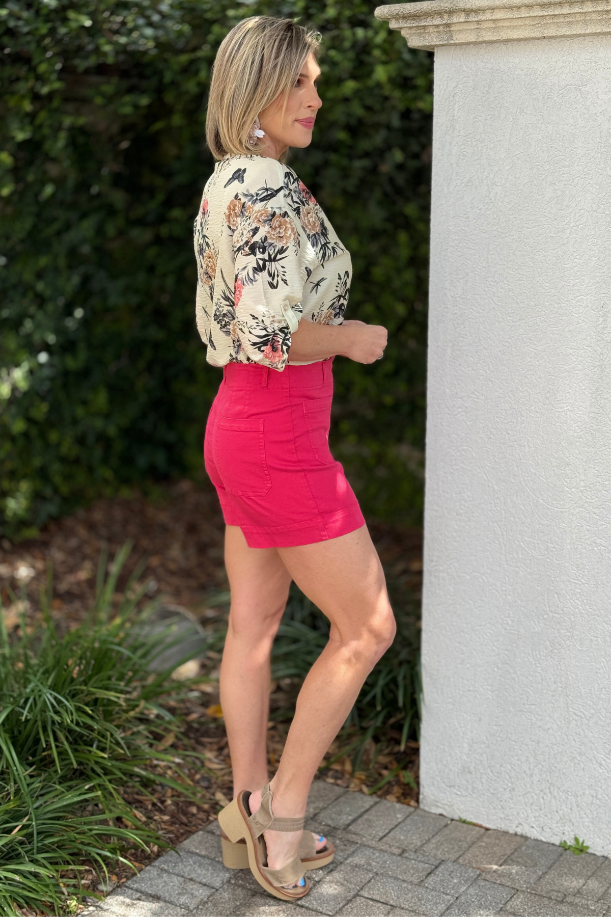 Renuar terracotta Tencel shorts styled with striped long sleeve top