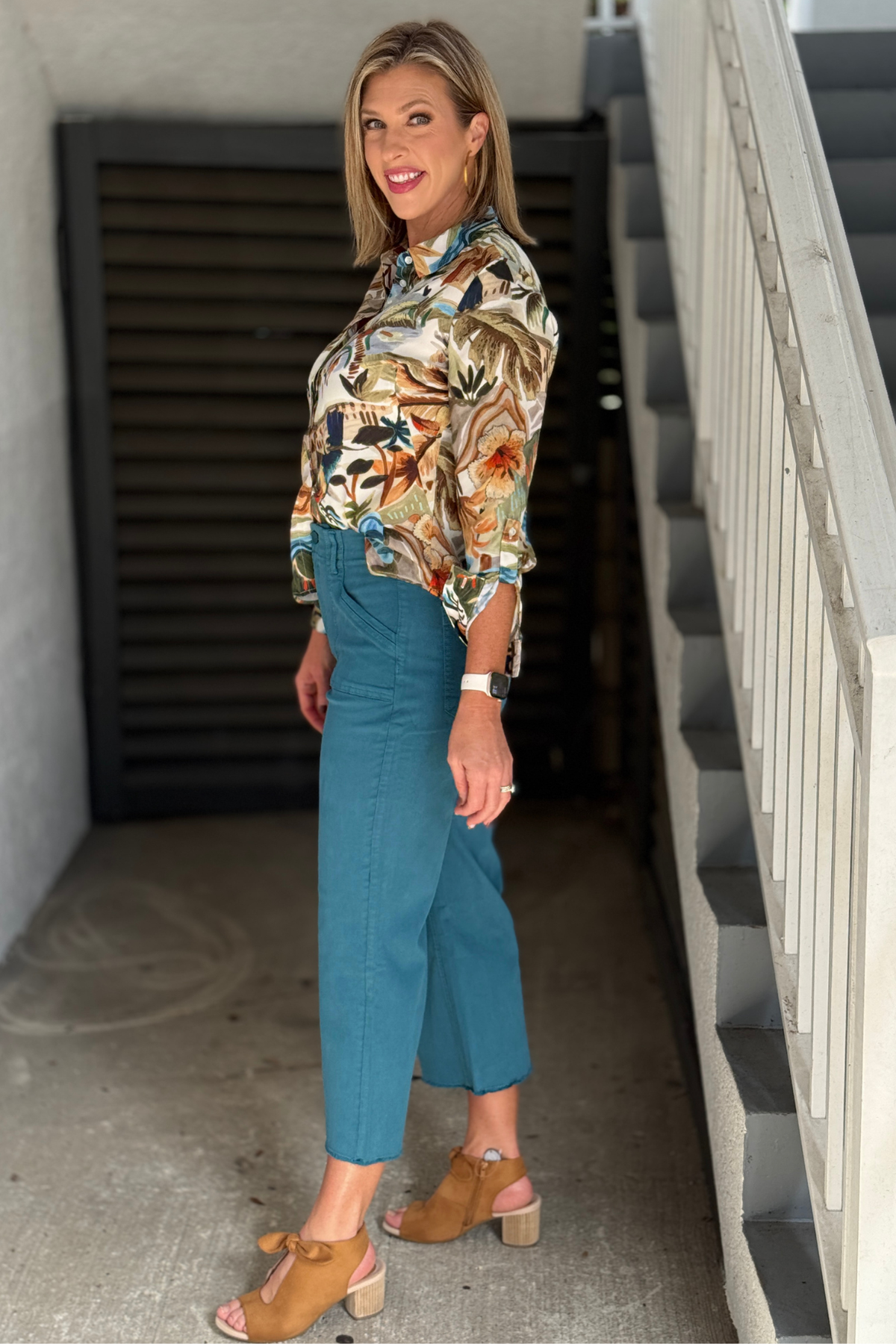 Renuar teal wide leg pants styled with a printed blouse