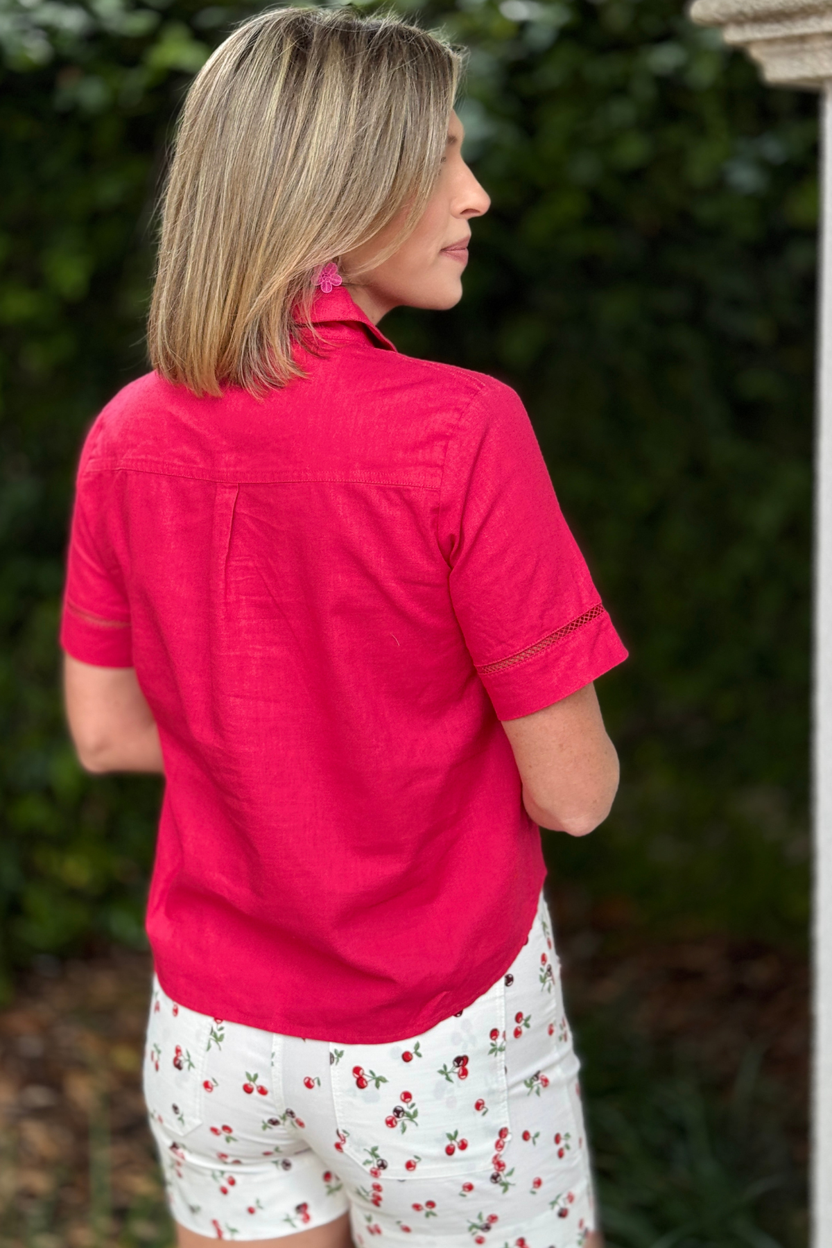 back view of renuar linen blend blouse in terracotta color