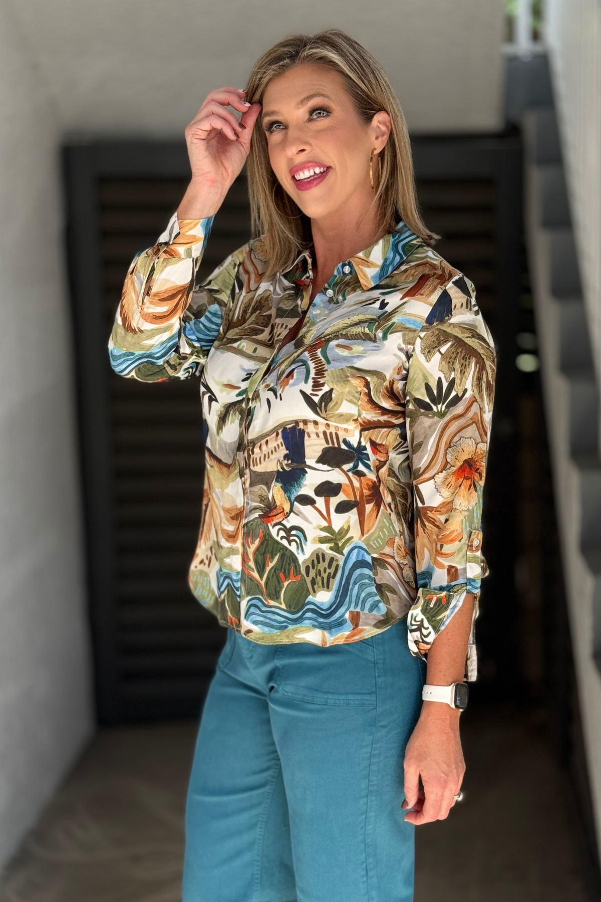 Renuar printed satin blouse styled with teal pants