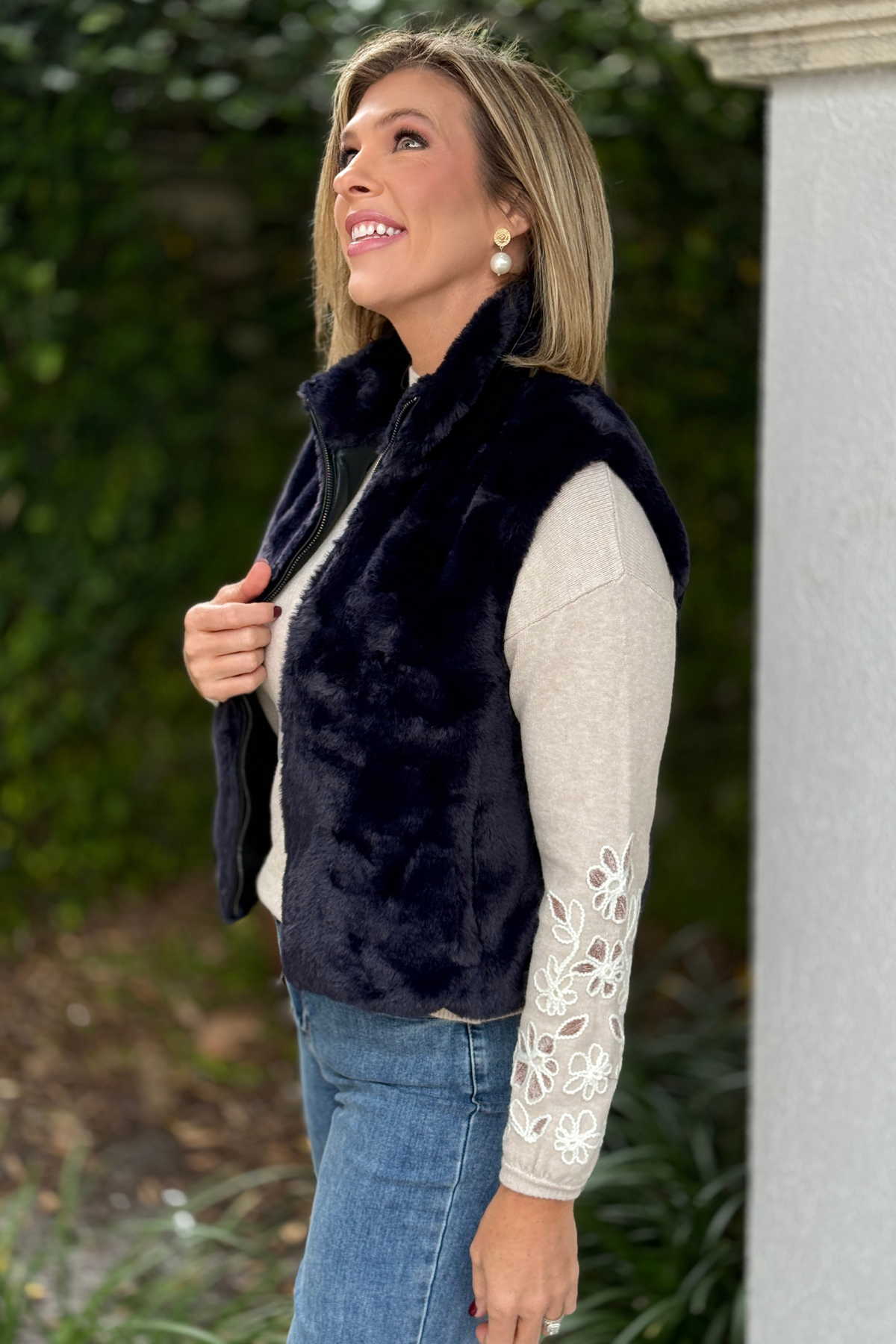 Soft navy faux fur vest with zip front and side pockets